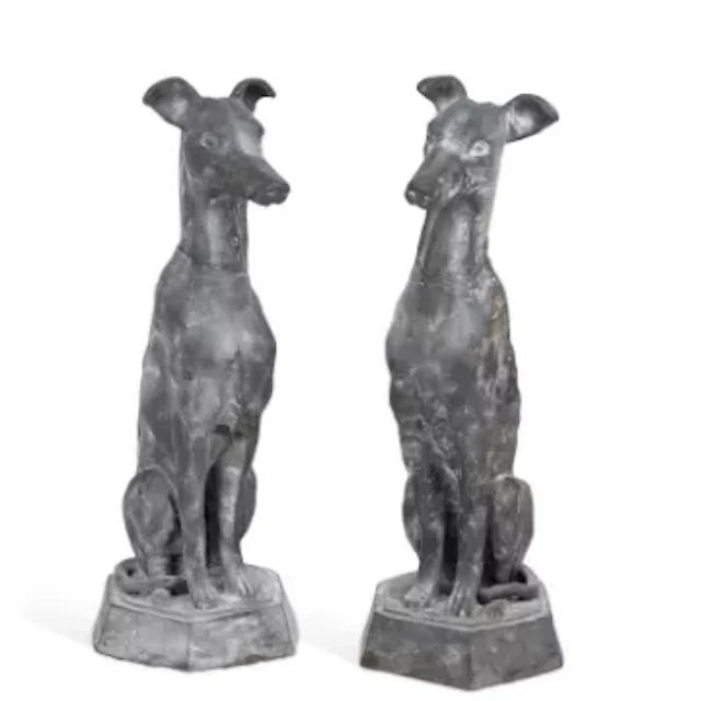 A PAIR OF CAST METAL MODELS OF SEATED WHIPPETS