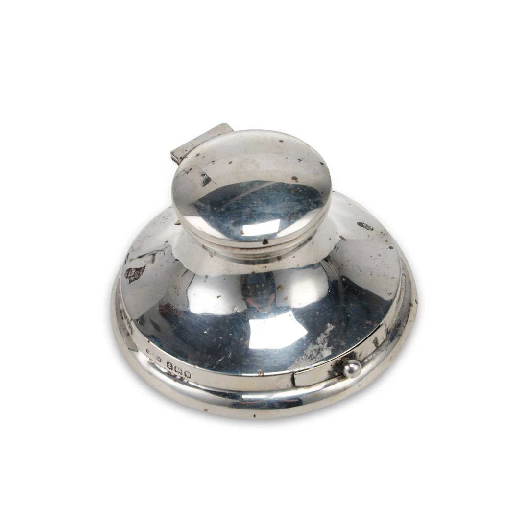AN EDWARDIAN SILVER INKWELL