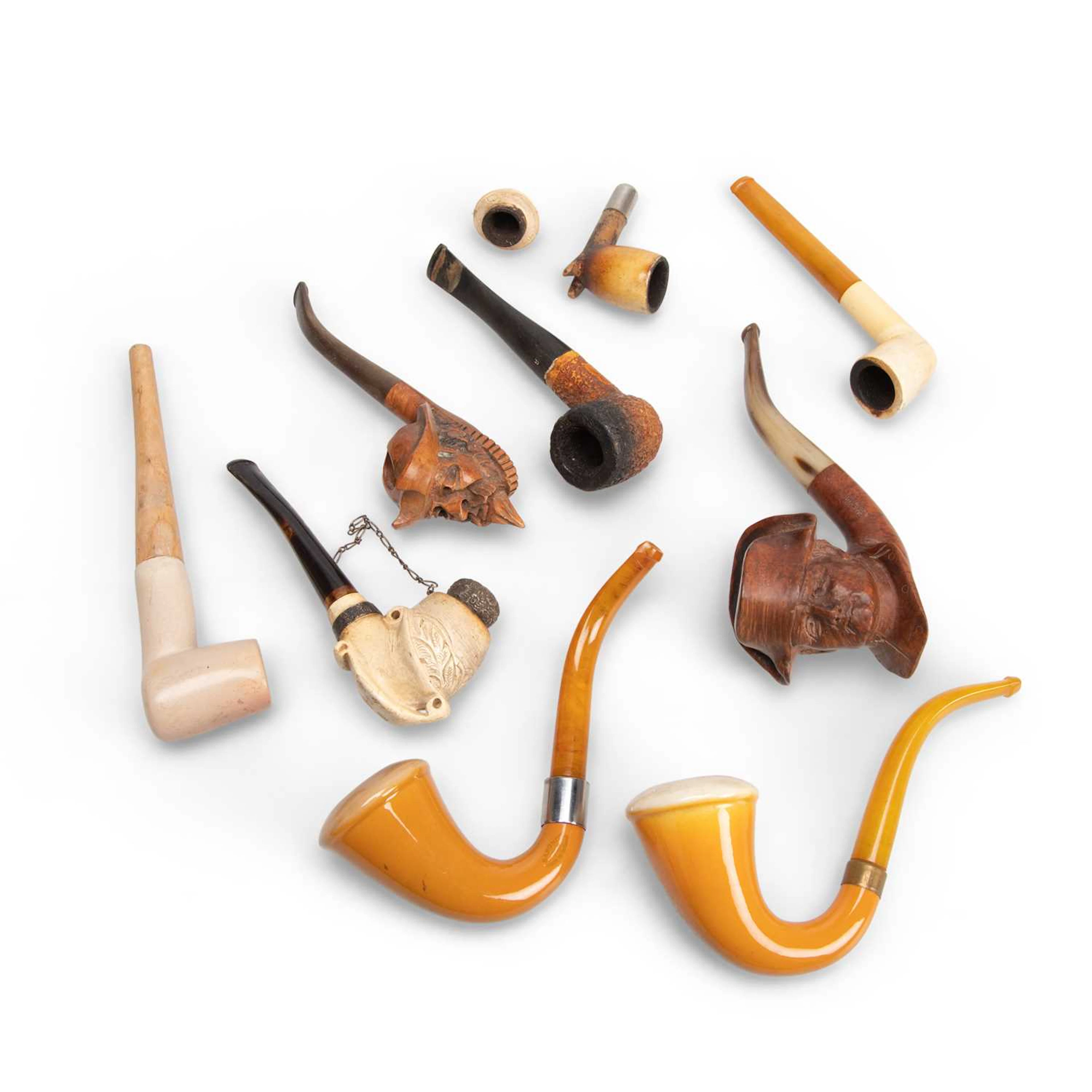 A GROUP OF SMOKING PIPES