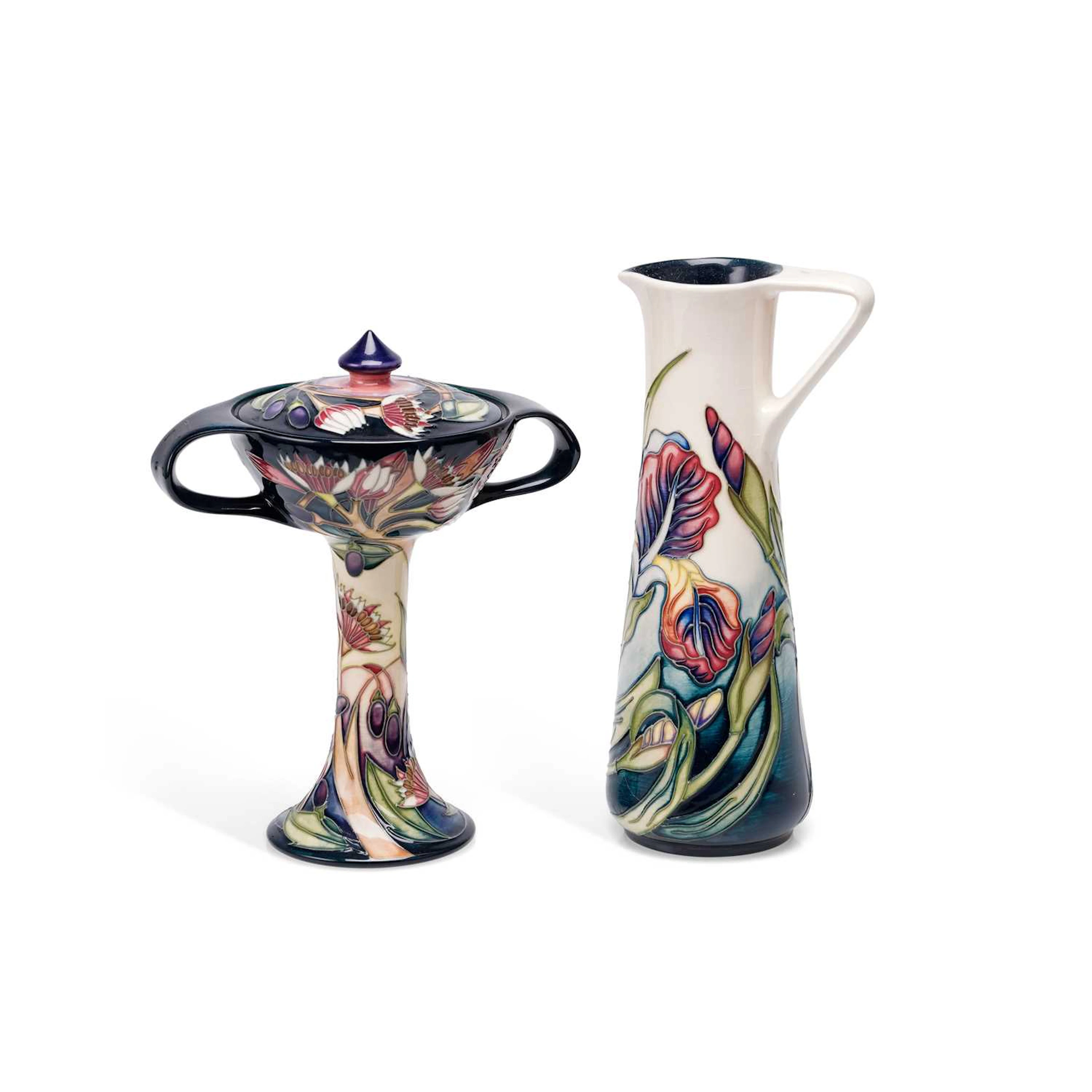 A MOORCROFT JUG AND A CUP AND COVER