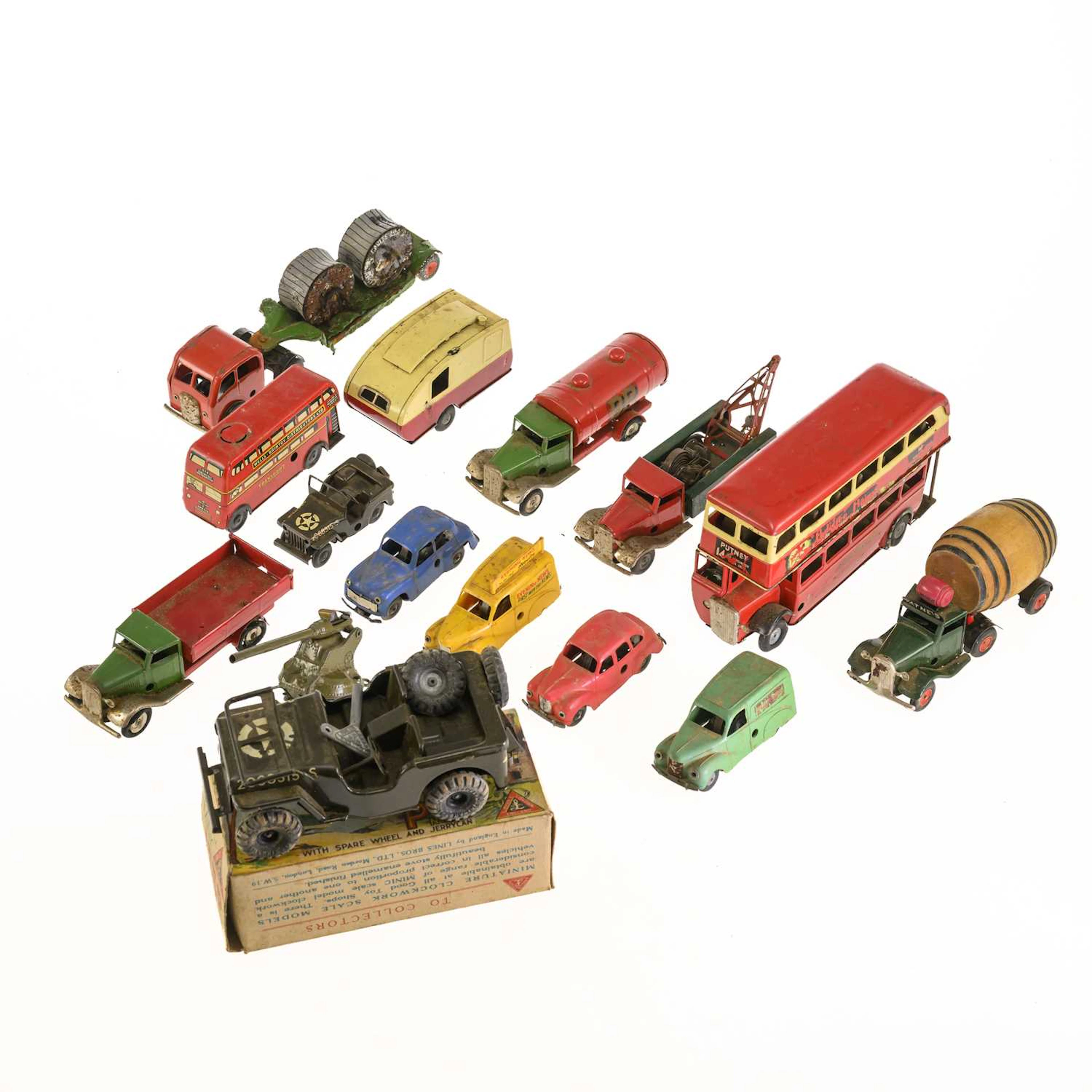 A GROUP OF TRI-ANG MINIC TINPLATE TOYS