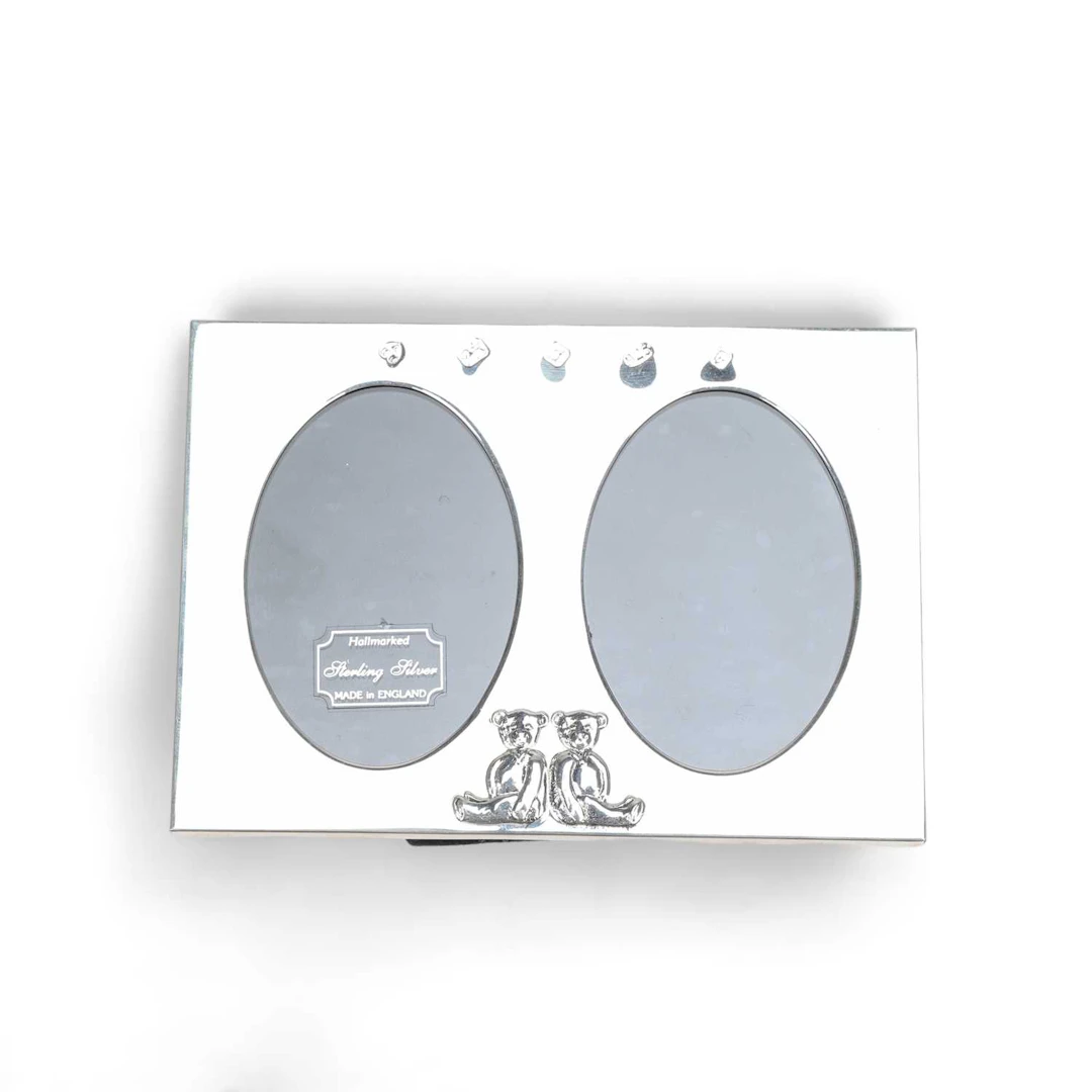 A MODERN SILVER DOUBLE PHOTOGRAPH FRAME