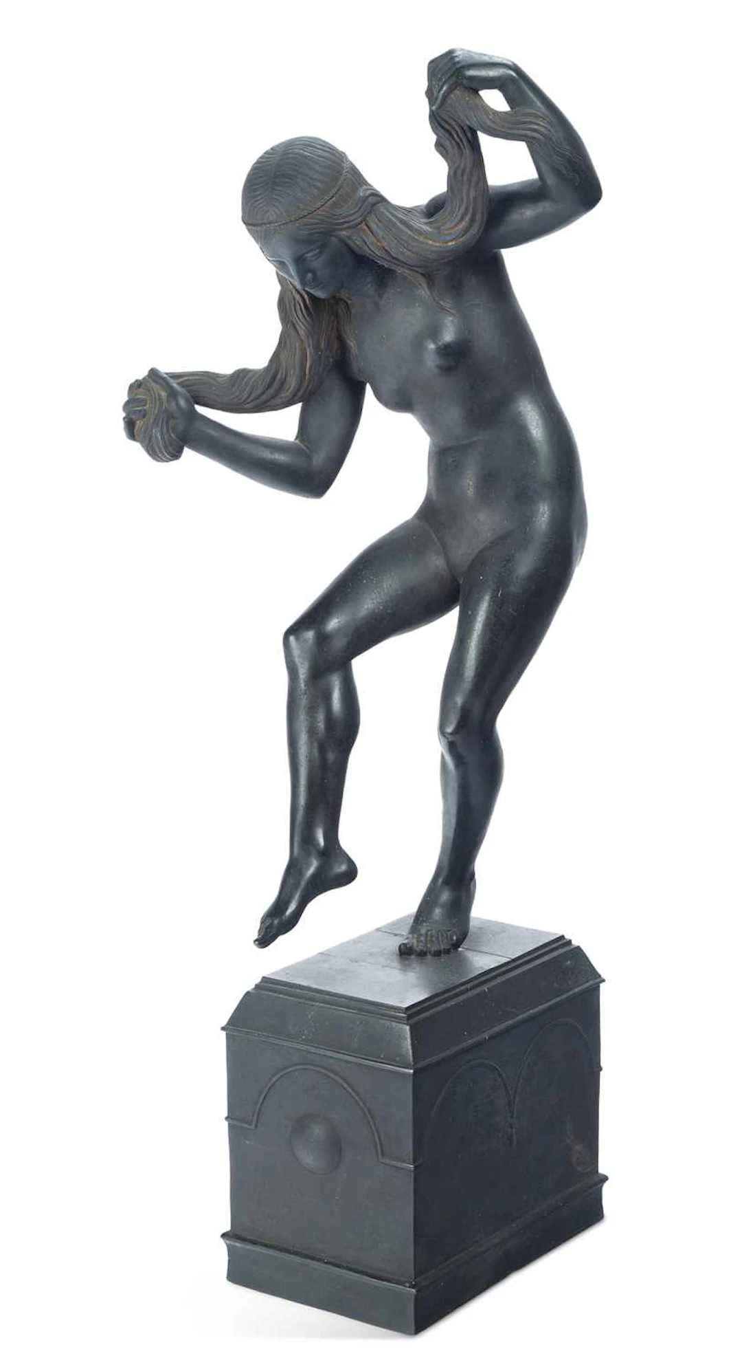 A BRONZE FIGURE OF A BATHER