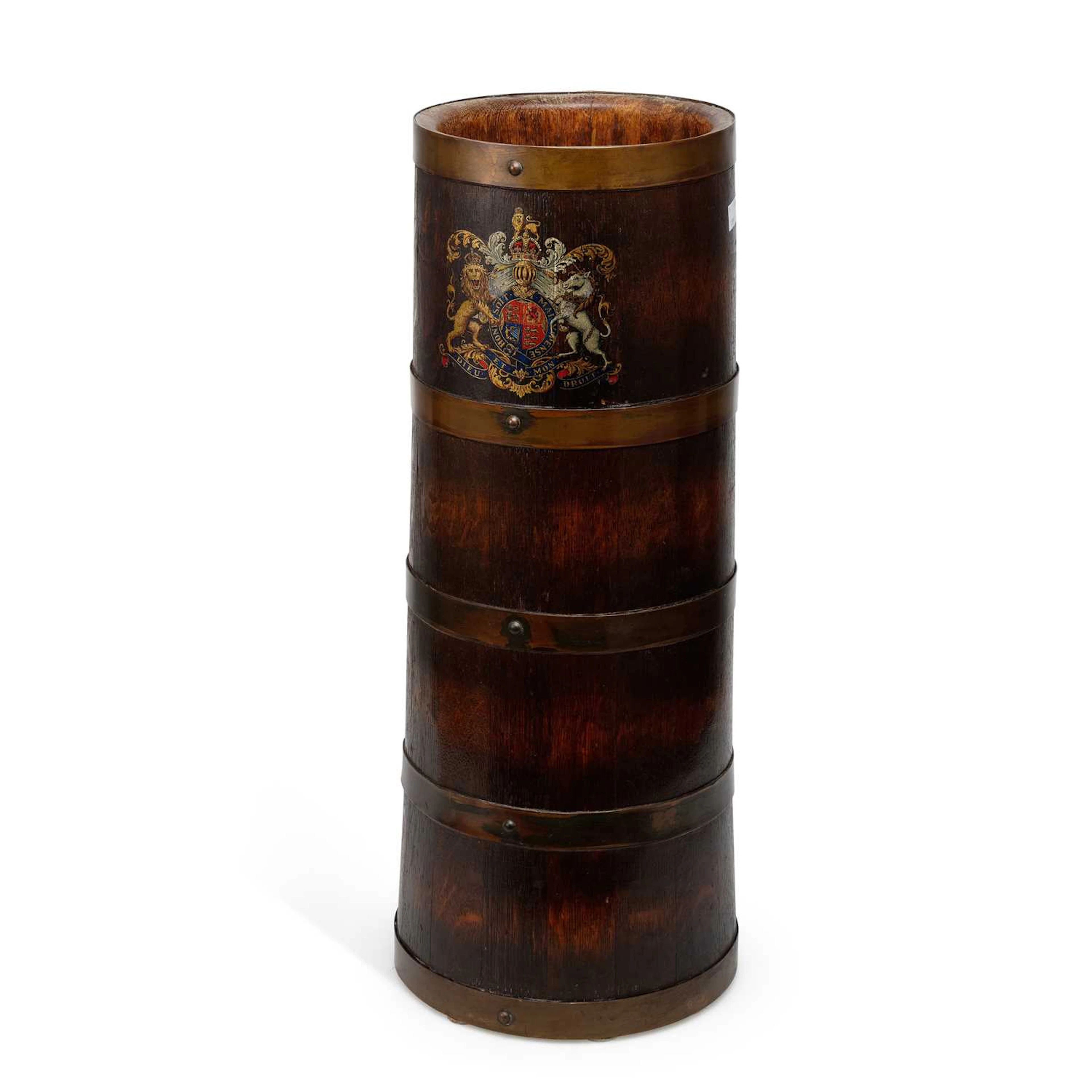 AN OAK AND BRASS BOUND STICK STAND