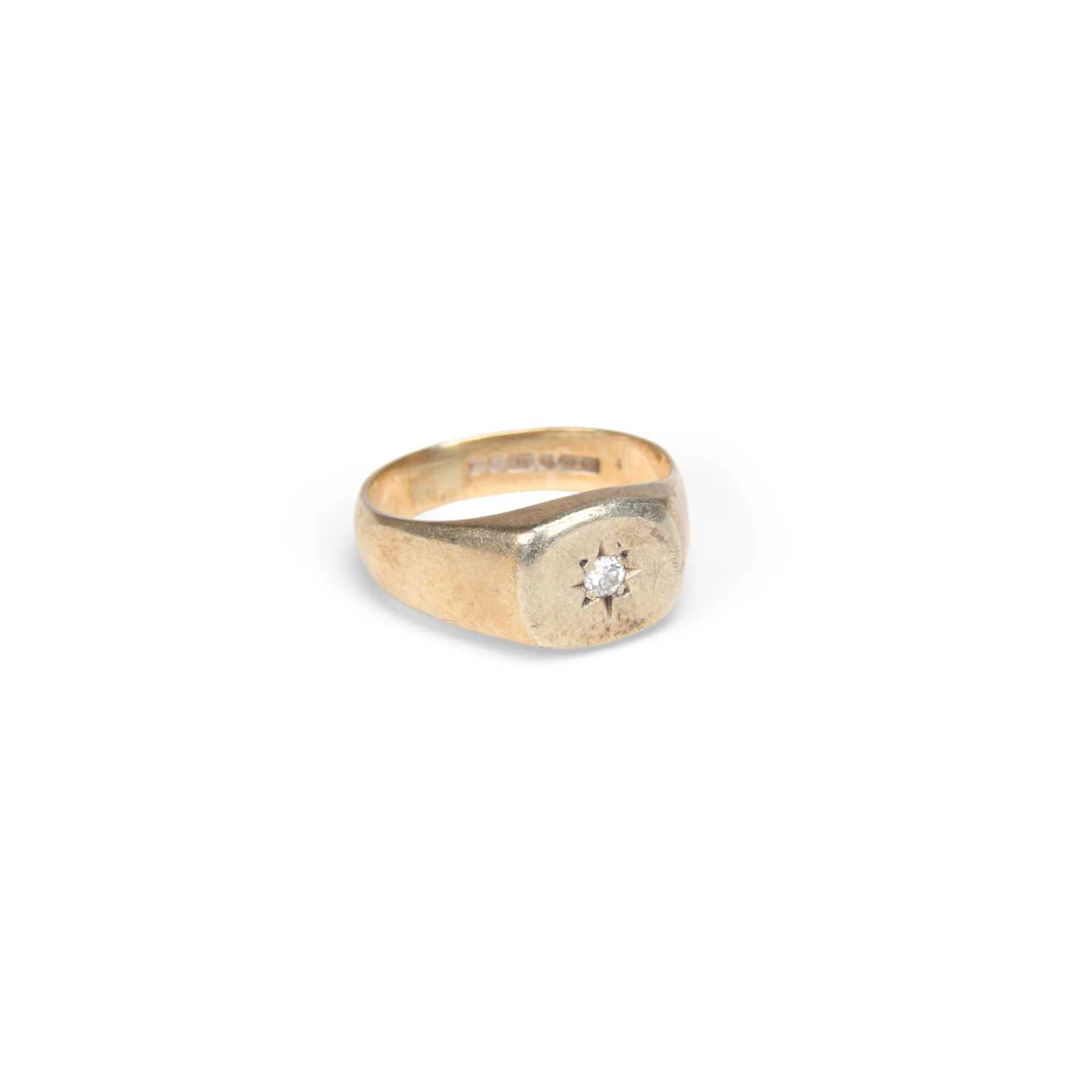 A 9CT GOLD DIAMOND SIGNET RING