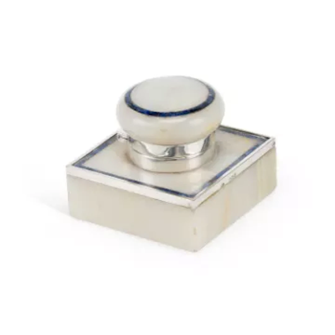 A GEORGE V ART DECO SILVER MOUNTED ONYX AND STONE INKWELL