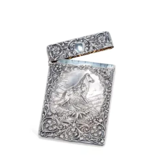 AN EDWARDIAN SILVER CARD CASE