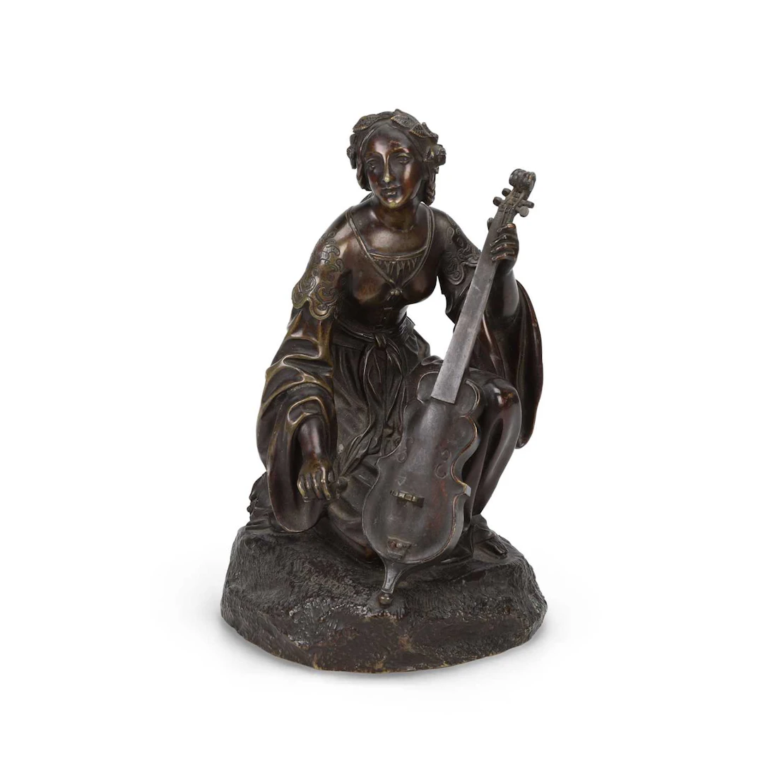 A FRENCH BRONZE FIGURE OF A FEMALE MUSICIAN