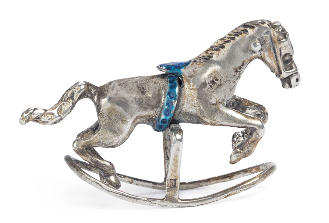 A RUSSIAN SILVER MINIATURE ROCKING HORSE