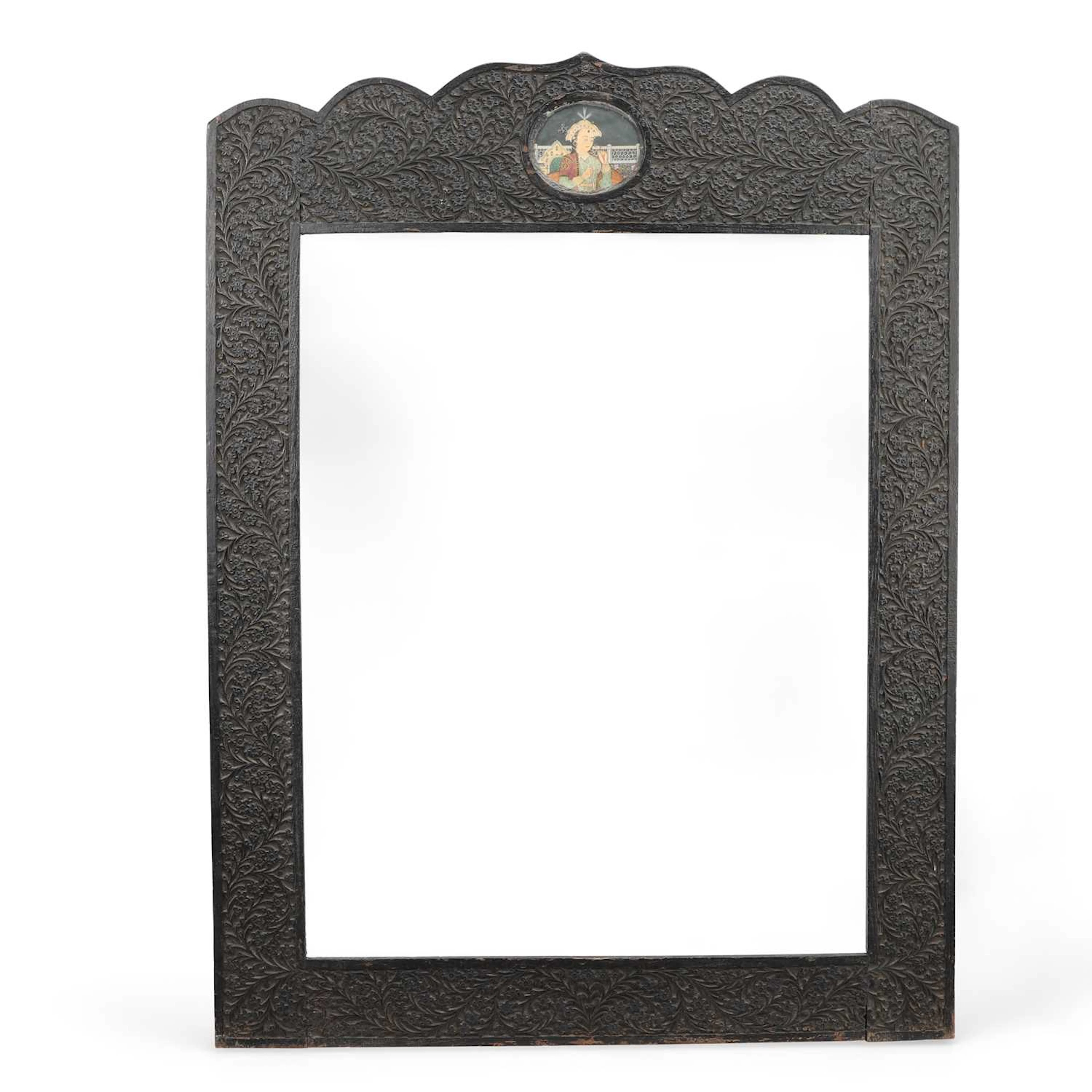 AN ANGLO-INDIAN CARVED HARDWOOD FRAME
