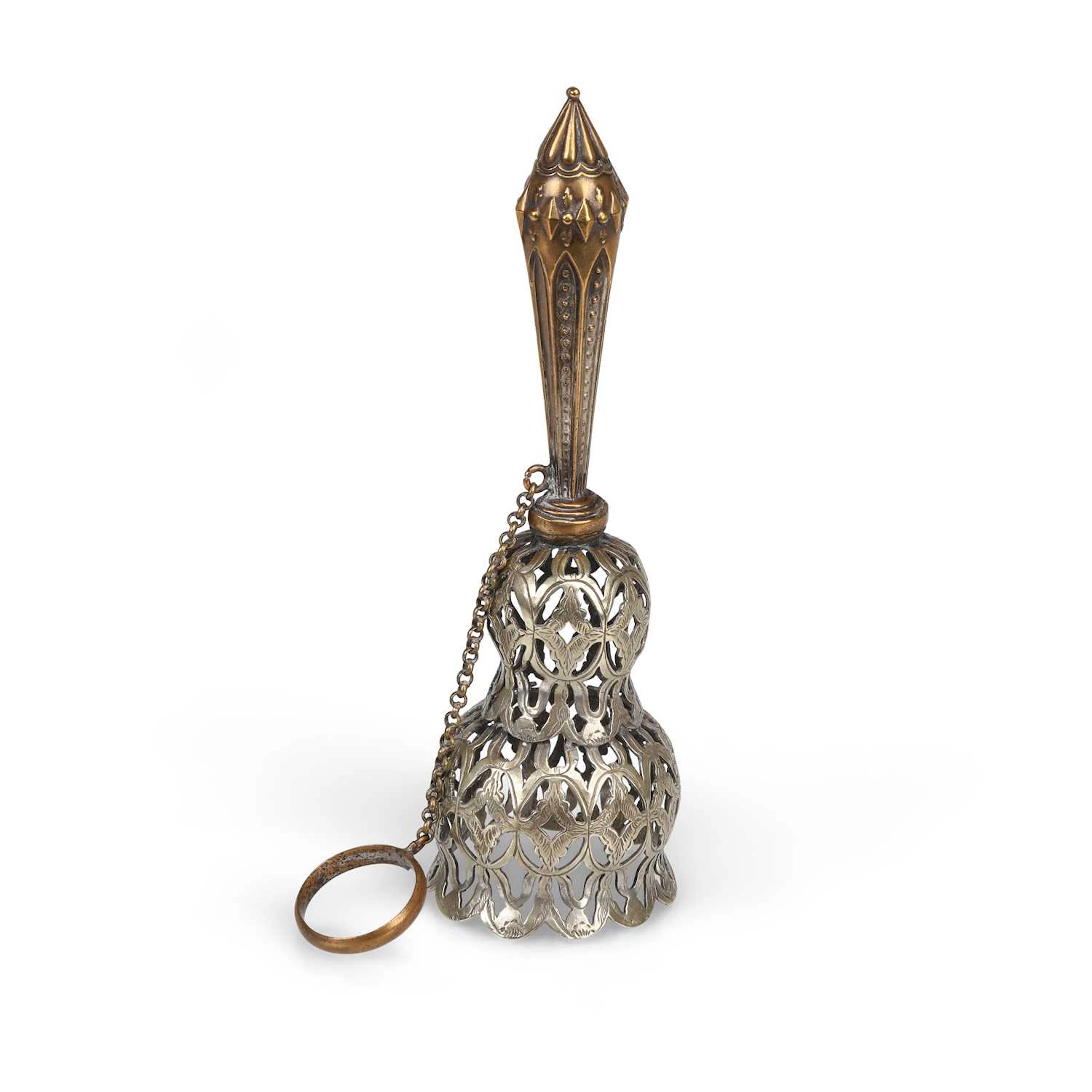 A VICTORIAN SILVERED METAL POSY HOLDER IN THE GOTHIC TASTE