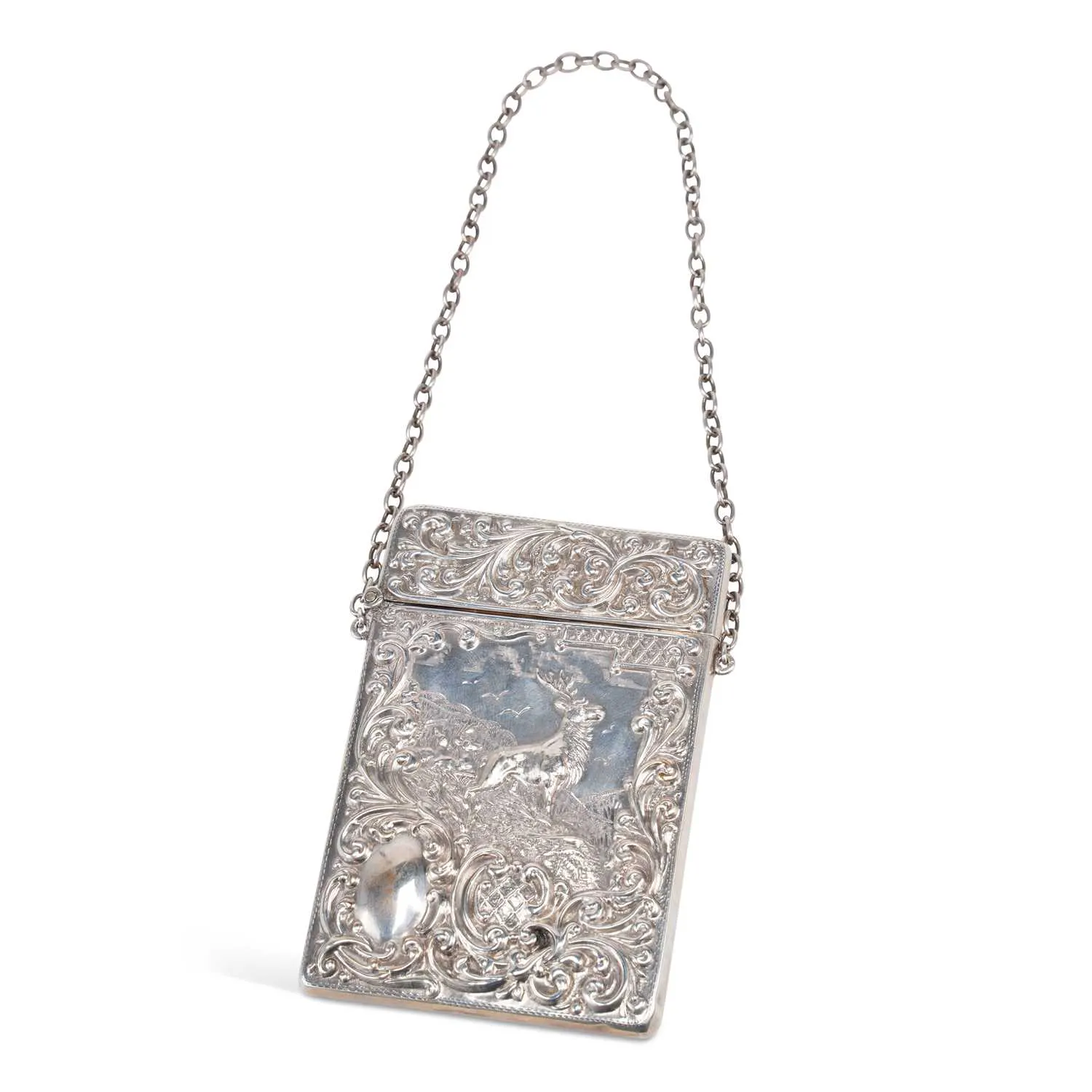 AN EDWARDIAN SILVER CARD CASE