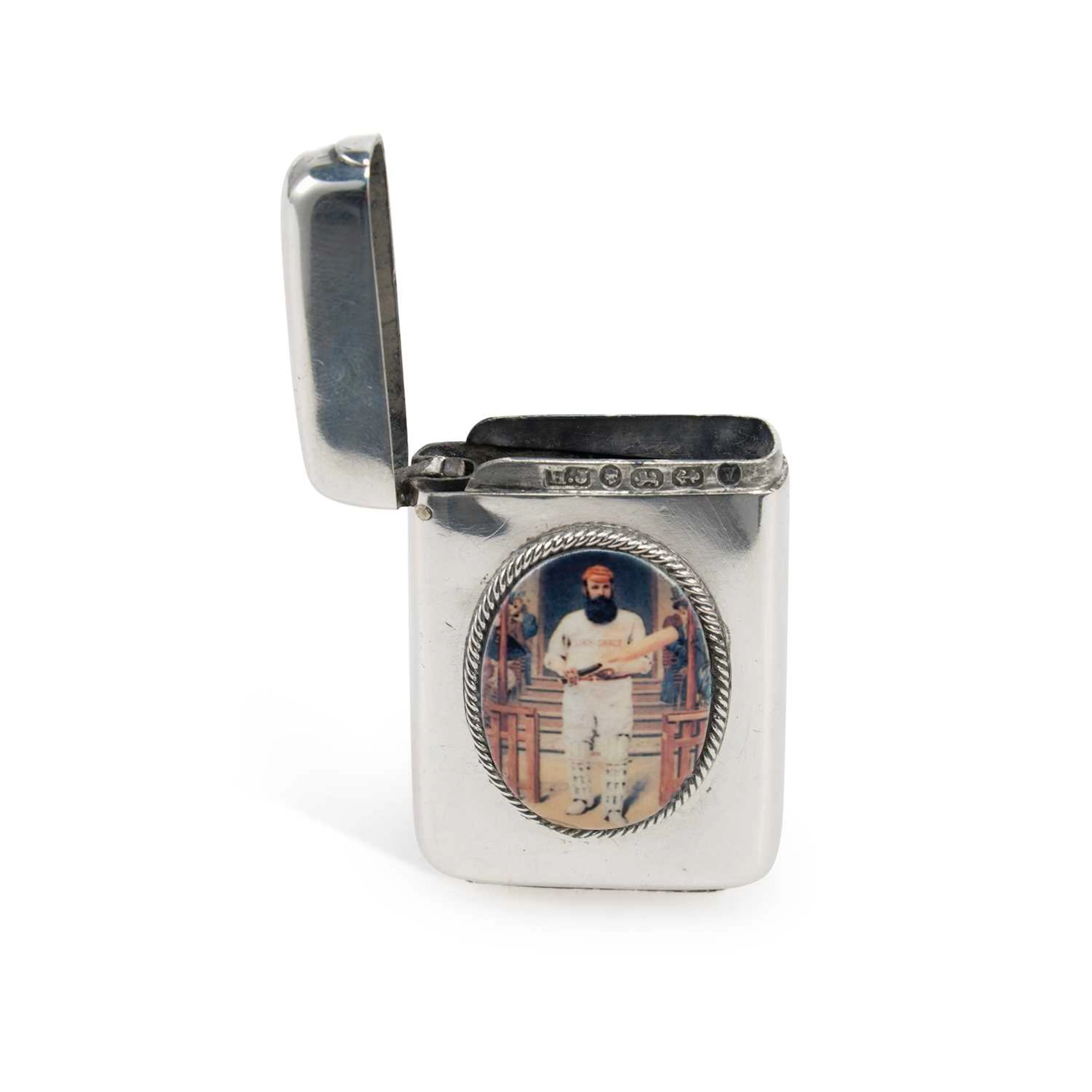 CRICKET INTEREST: A VICTORIAN SILVER AND ENAMEL VESTA CASE