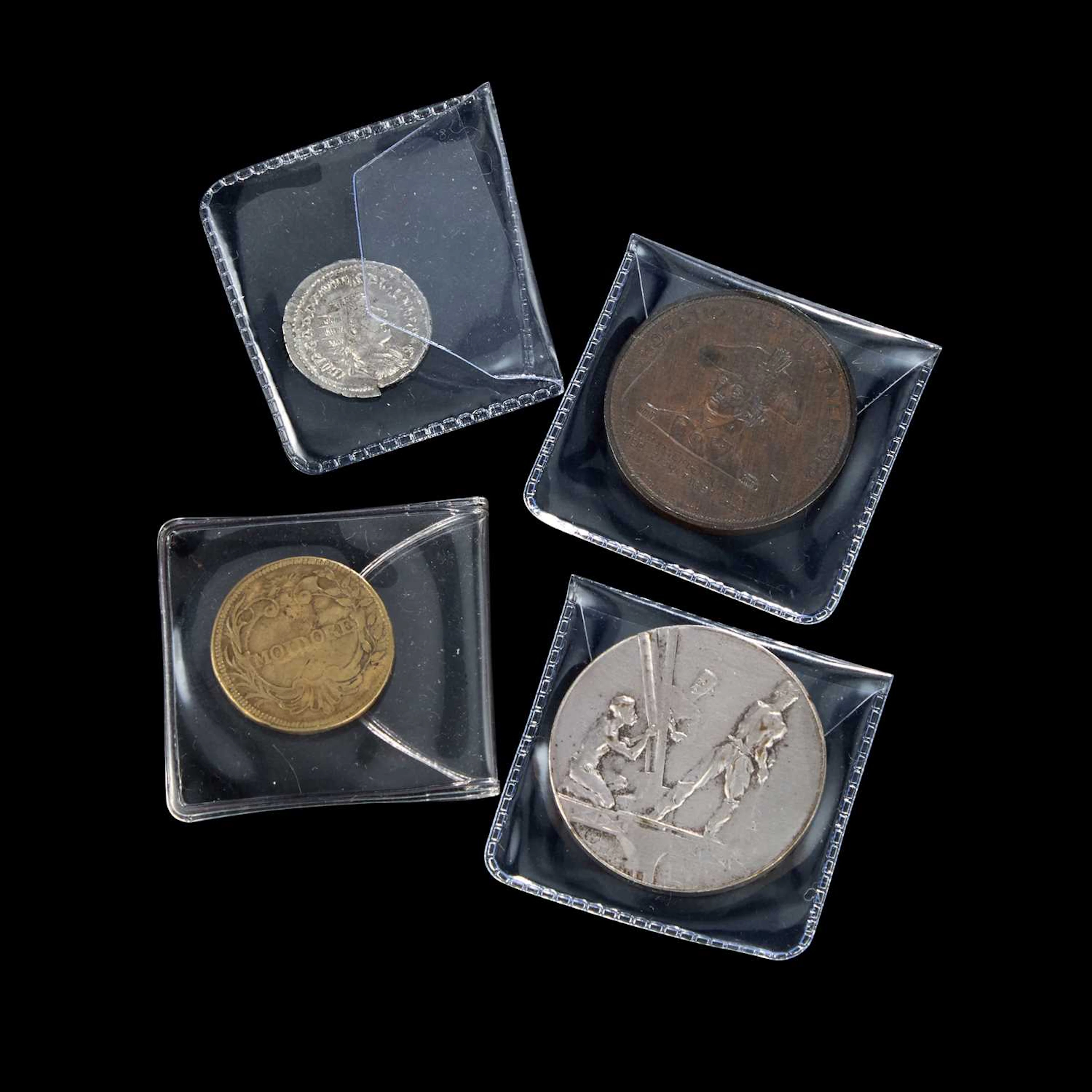 A GROUP OF COINS AND MEDALLIONS