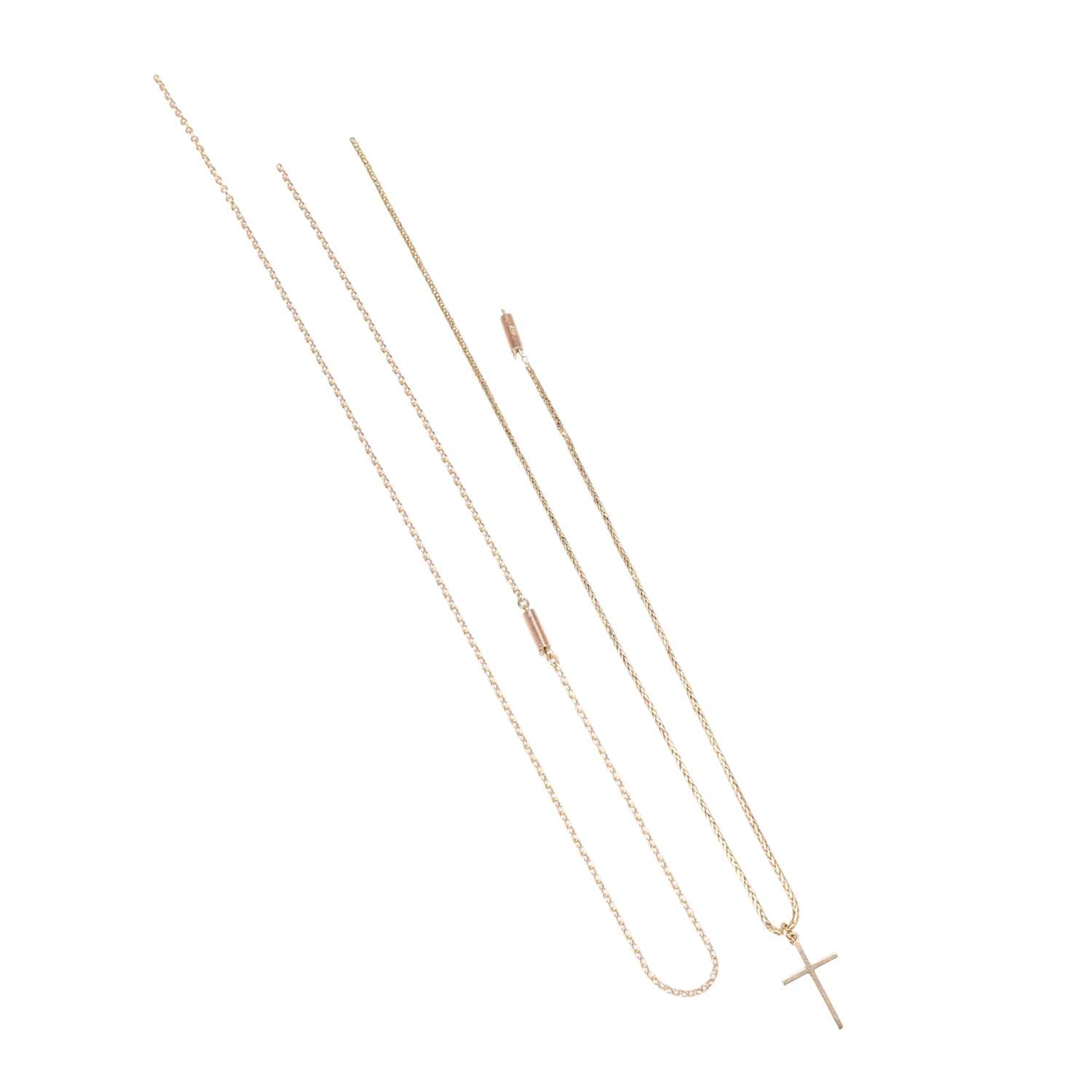 A 9 CARAT GOLD CROSS PENDANT AND TWO CHAINS