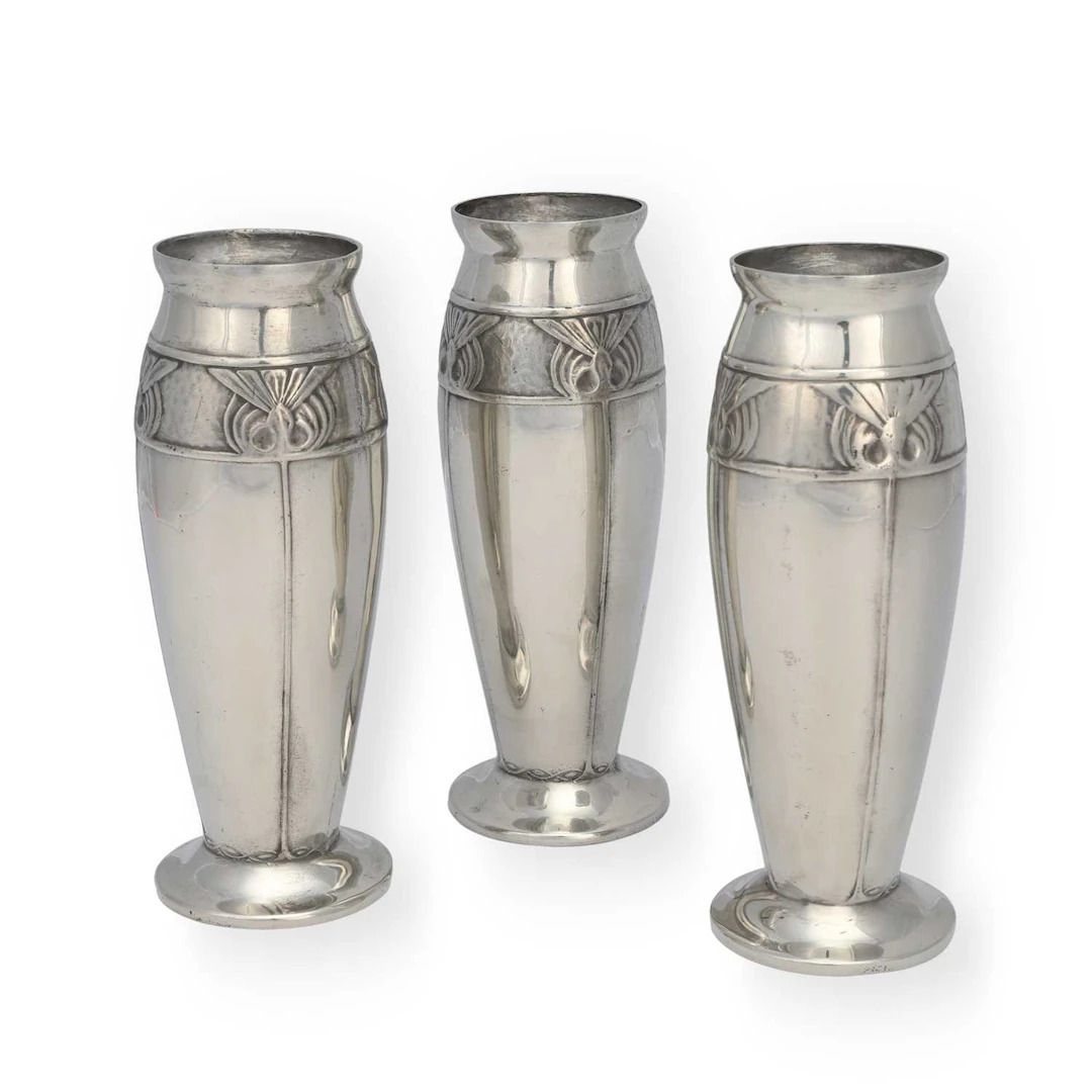 A SET OF THREE LIBERTY & CO TUDRIC PEWTER VASES