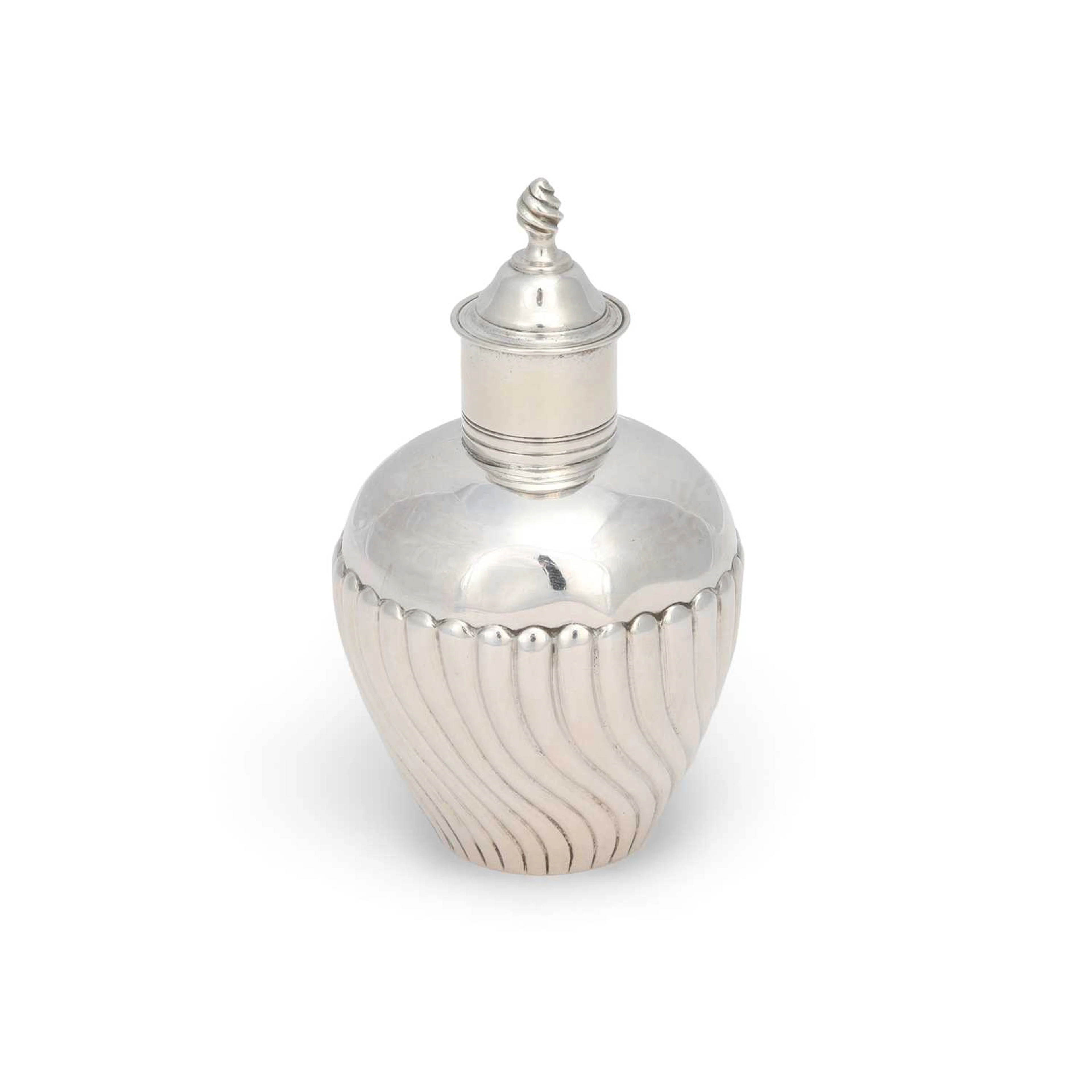 A GEORGE III SILVER TEA CADDY