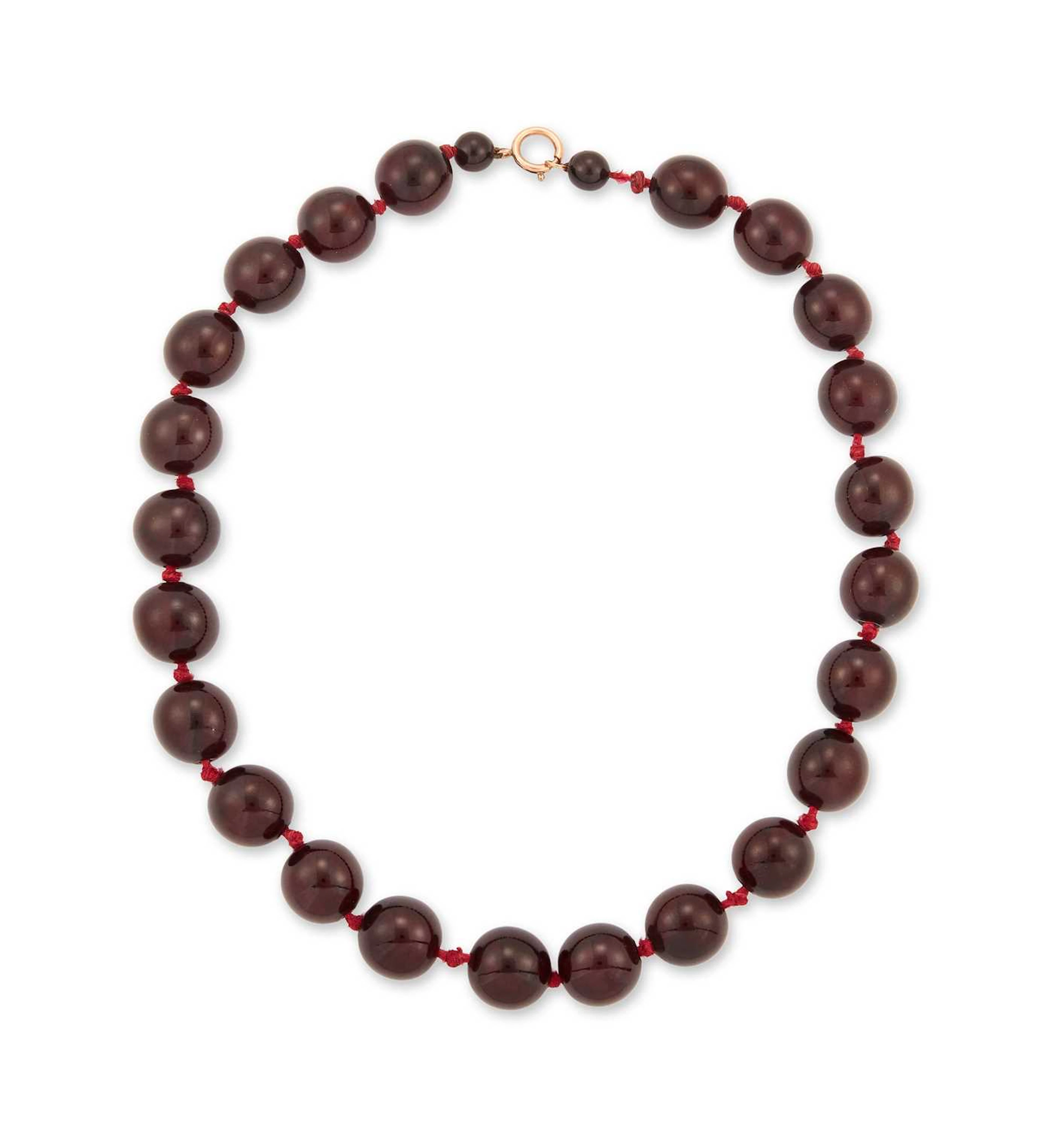 A CHERRY AMBER BAKELITE BEAD NECKLACE