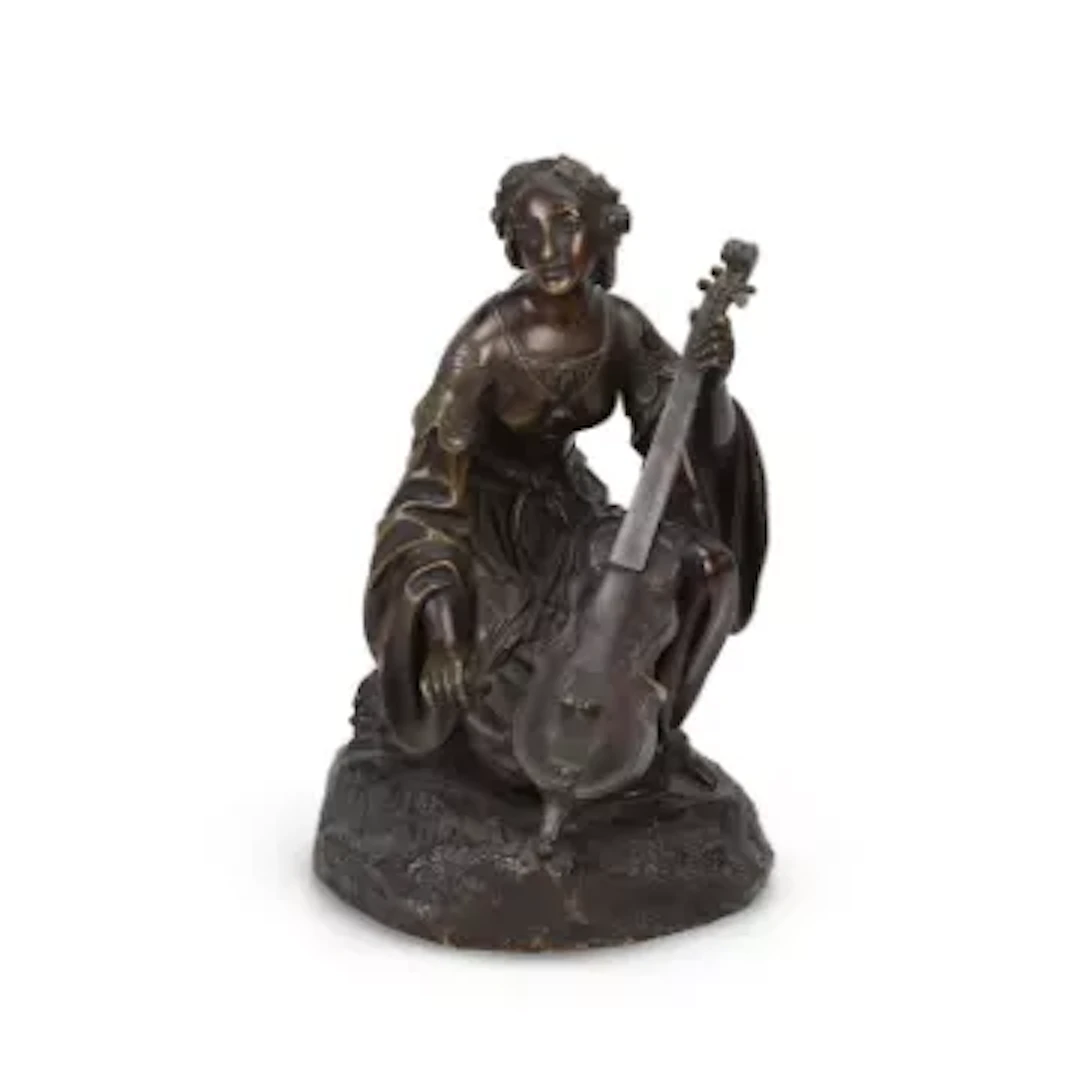 A FRENCH BRONZE FIGURE OF A FEMALE MUSICIAN