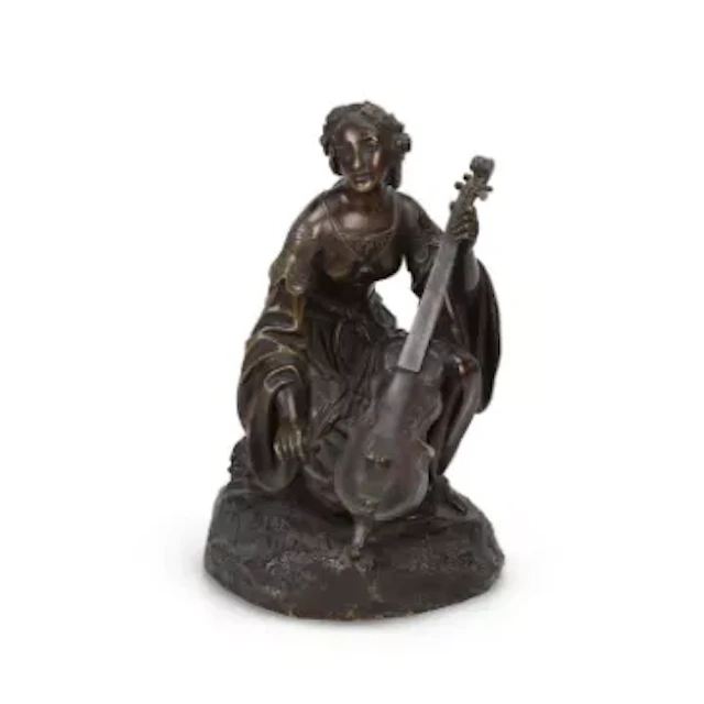 A FRENCH BRONZE FIGURE OF A FEMALE MUSICIAN