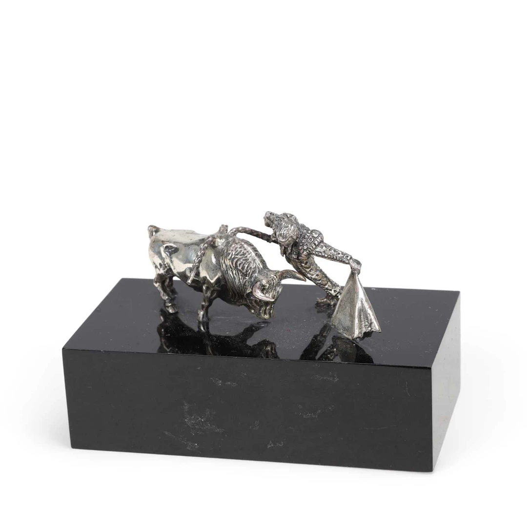 A SPANISH SILVER GROUP OF A BULL AND MATADOR
