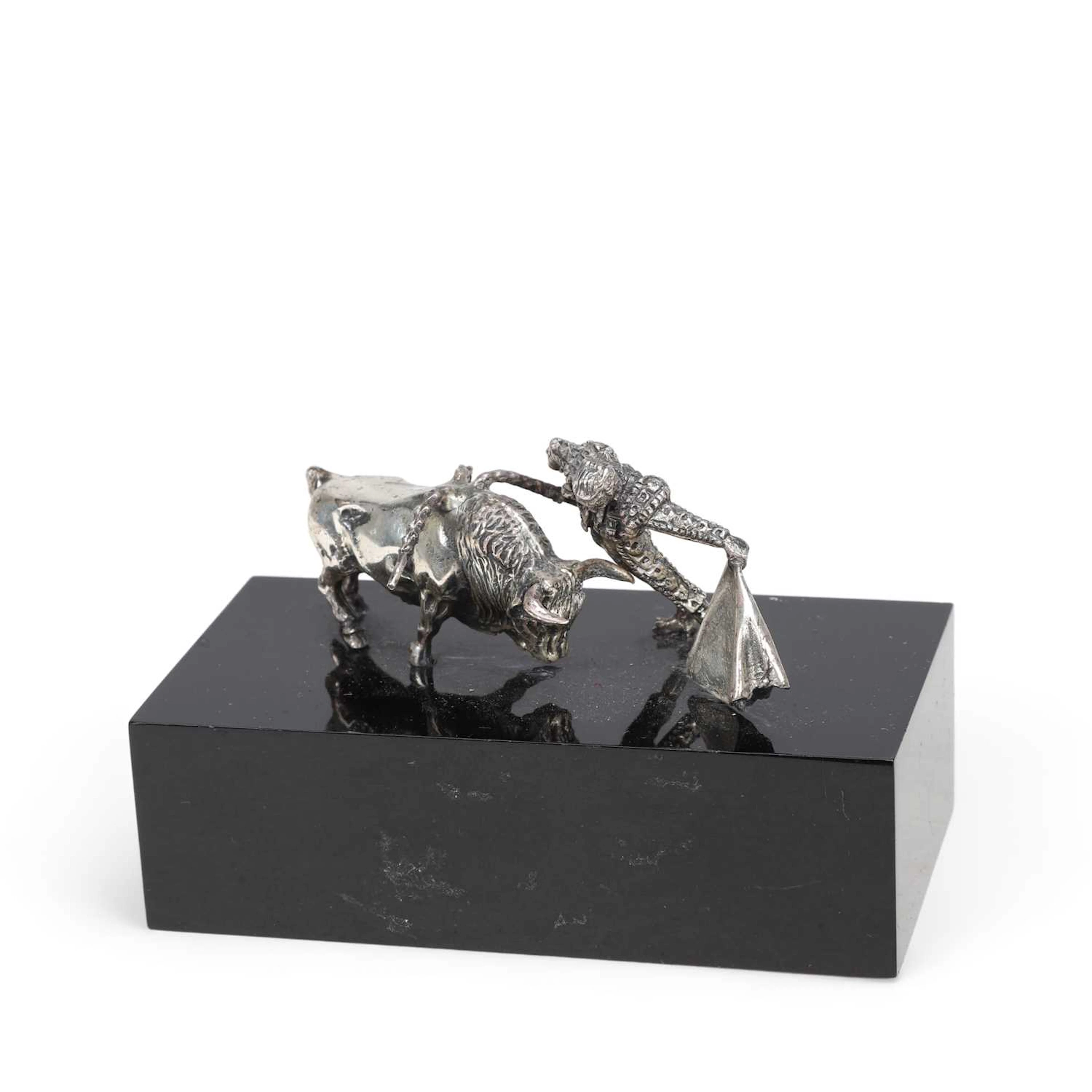 A SPANISH SILVER GROUP OF A BULL AND MATADOR