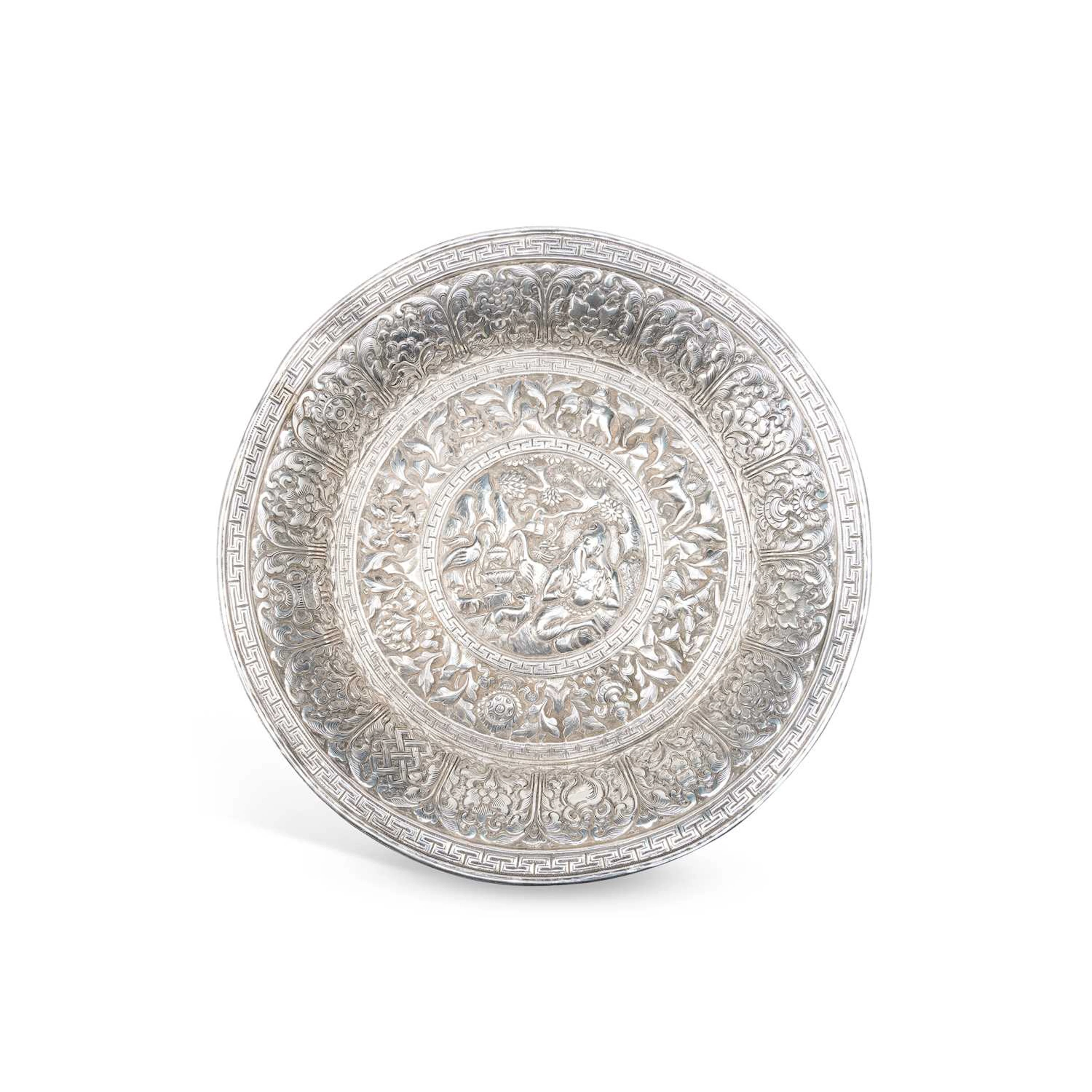 AN INDIAN SILVER DISH
