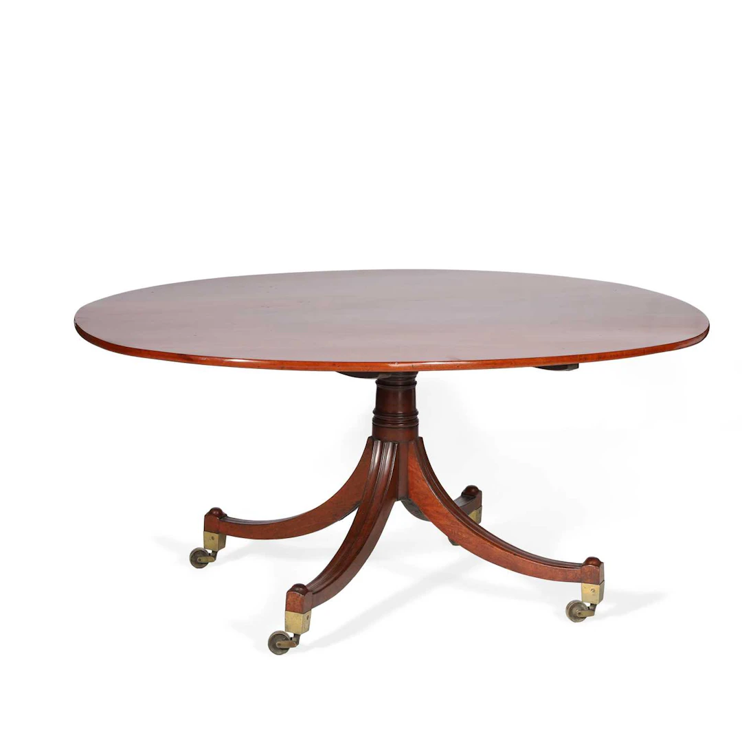 A REGENCY MAHOGANY BREAKFAST TABLE