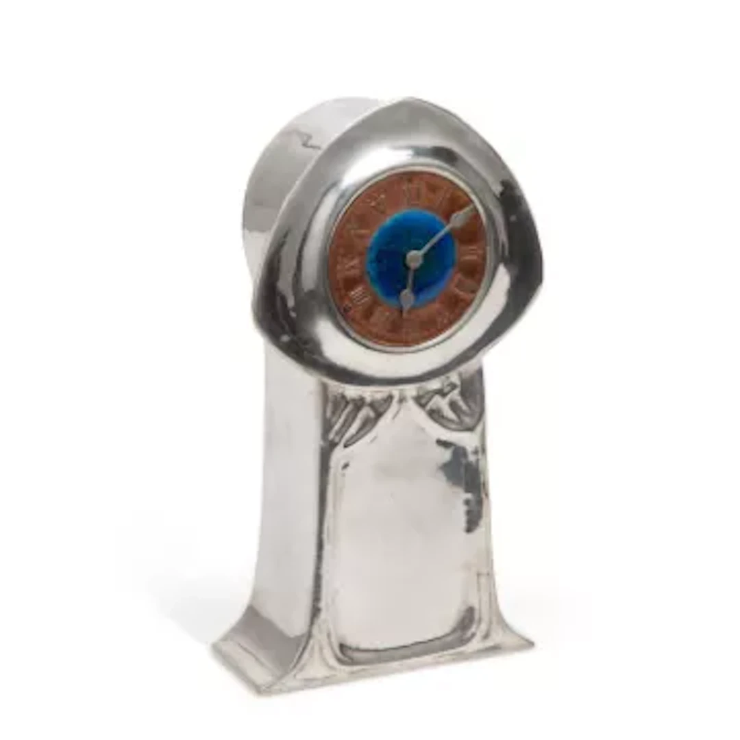 A LIBERTY & CO TUDRIC PEWTER AND ENAMEL MANTEL CLOCK DESIGNED BY DAVID VEASEY