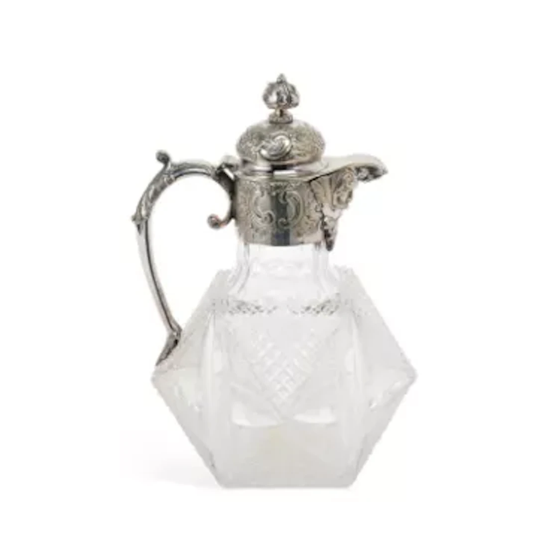 A VICTORIAN SILVER-PLATED AND CUT-GLASS CLARET JUG
