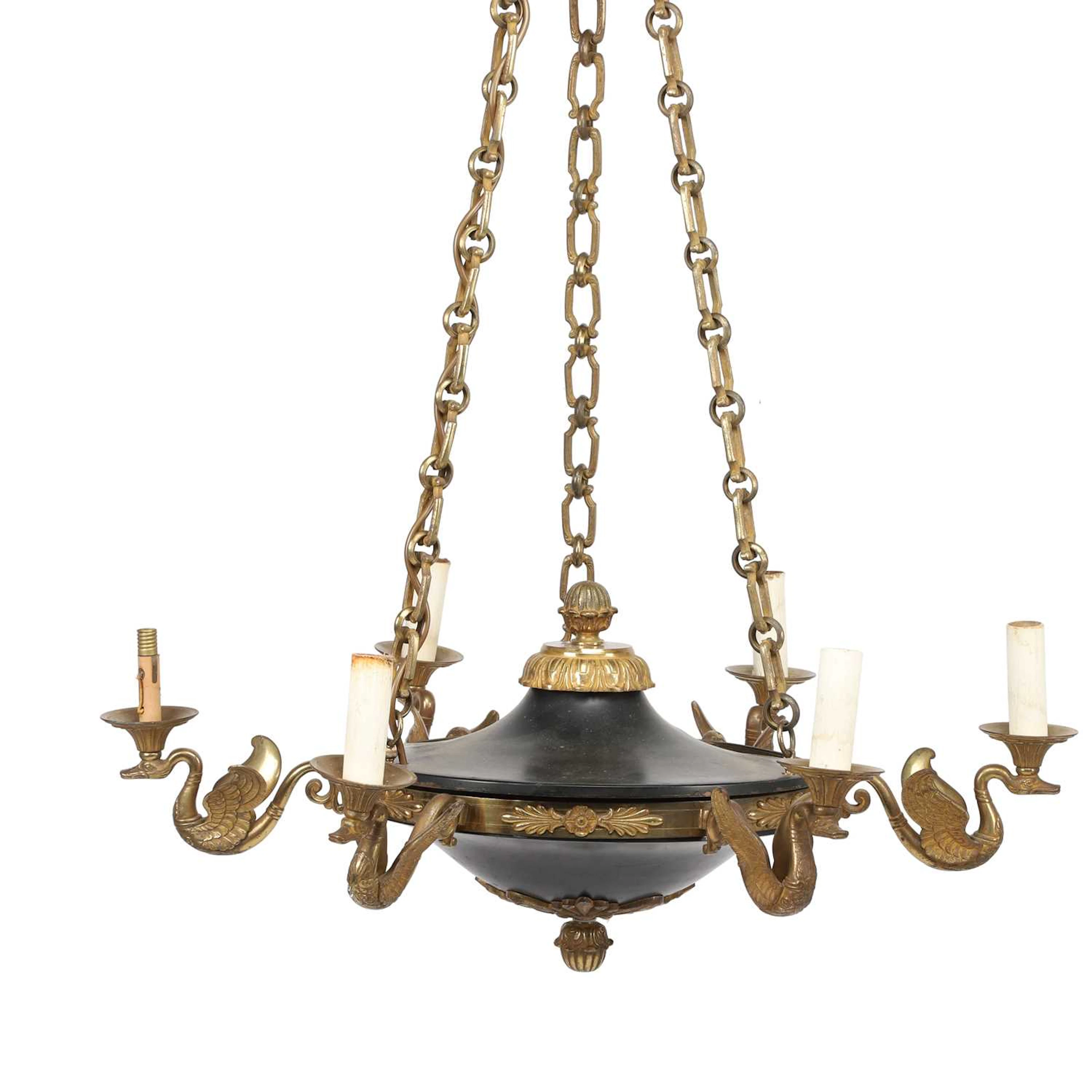 A GILT AND PATINATED METAL SIX-LIGHT CHANDELIER