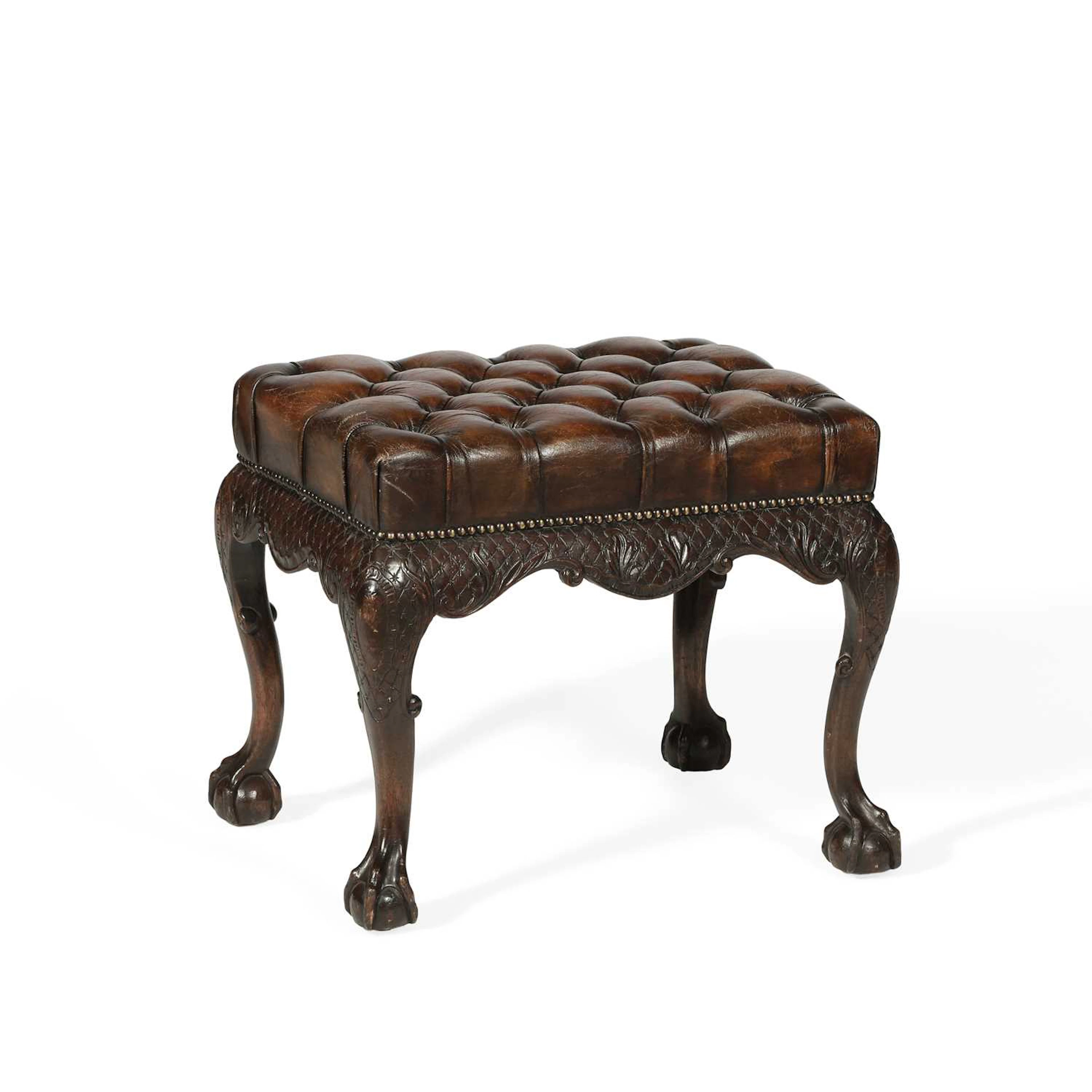 A GEORGE II STYLE MAHOGANY AND LEATHER UPHOLSTERED STOOL