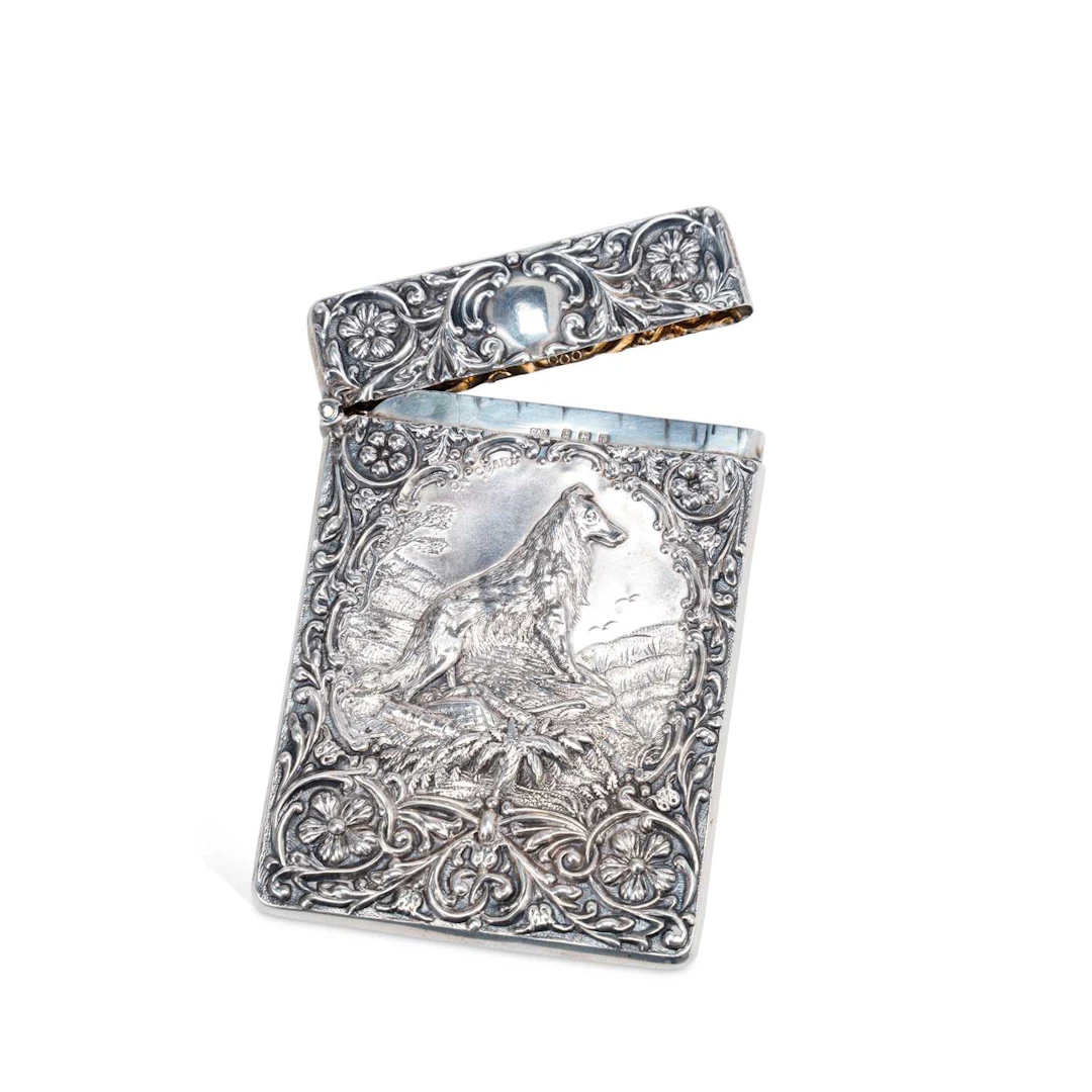 AN EDWARDIAN SILVER CARD CASE