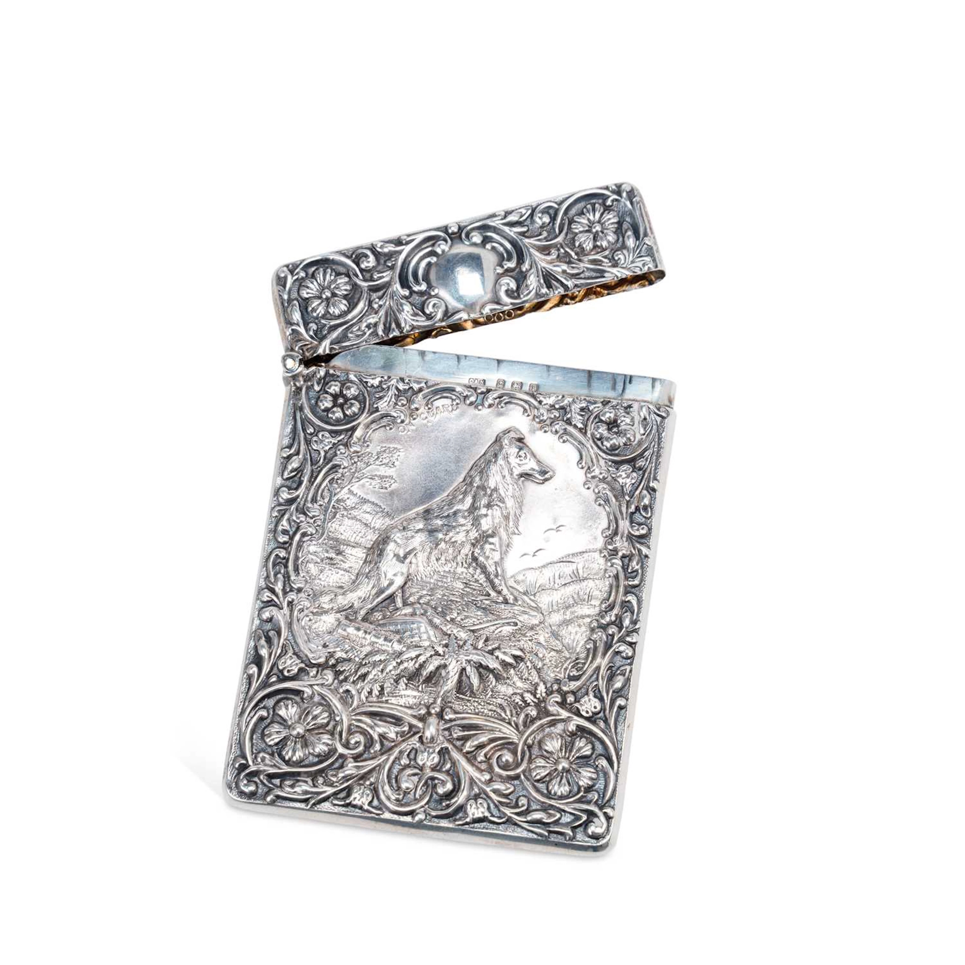 AN EDWARDIAN SILVER CARD CASE