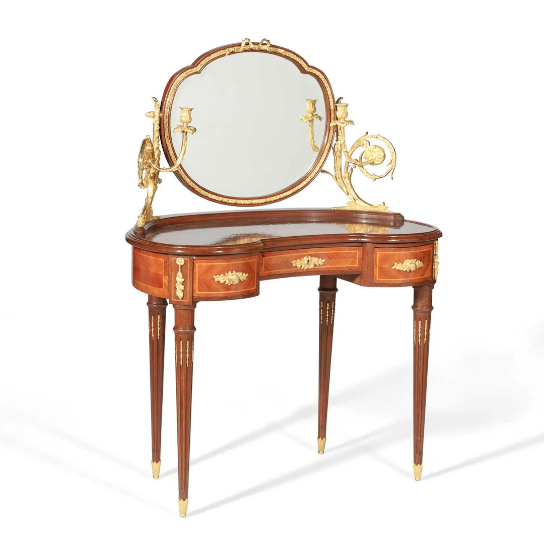 A LOUIS XVI STYLE ACAJOU, KINGWOOD, AND GILT BRONZE MOUNTED BUREAU