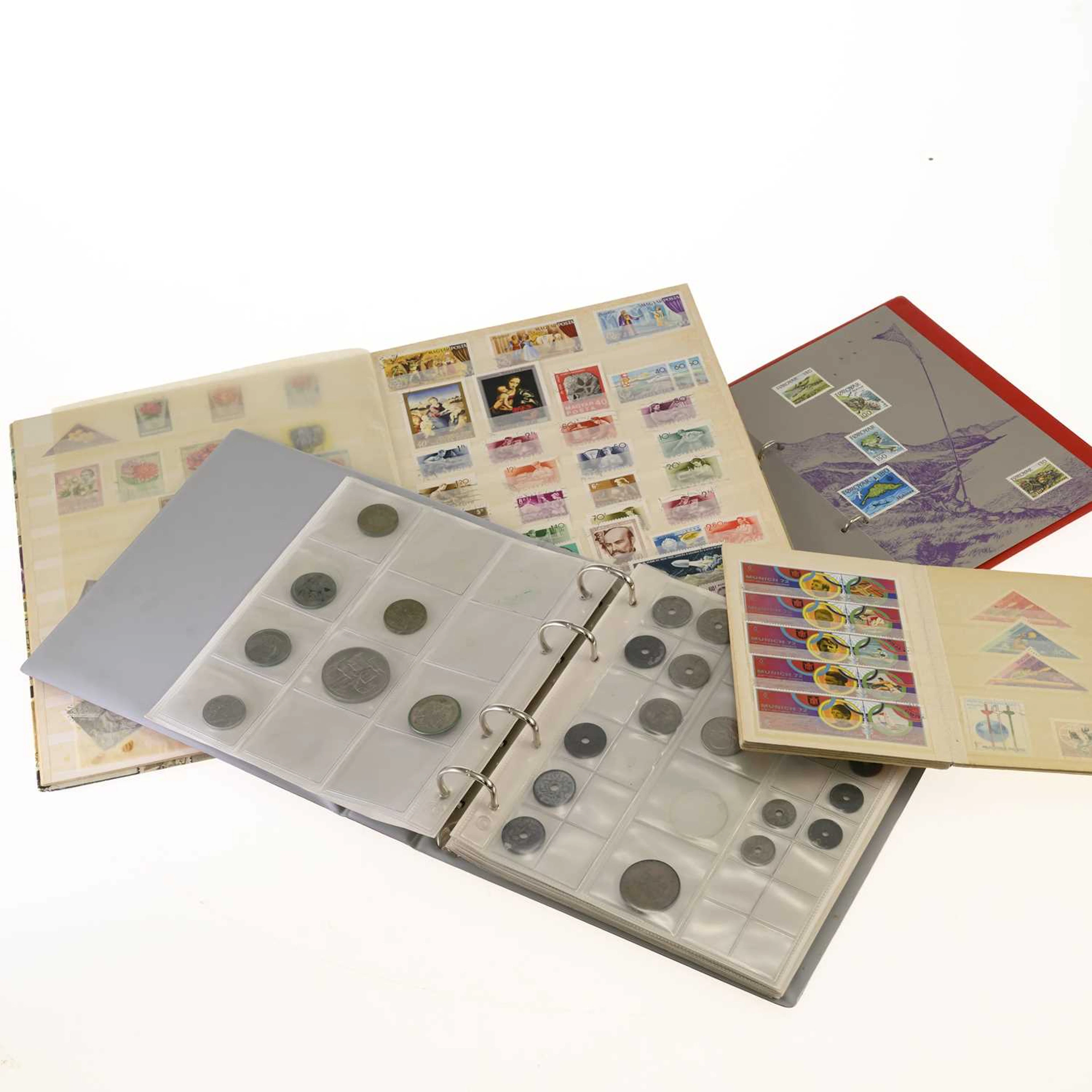 A COLLECTION OF WORLD STAMPS AND COINS