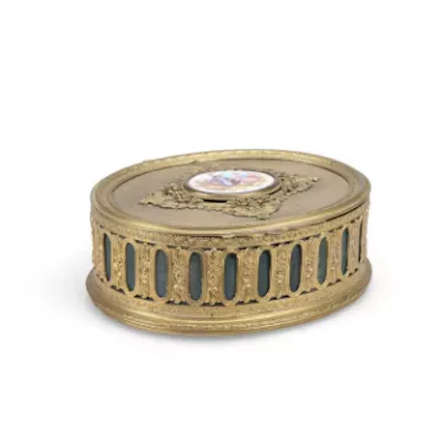 A FRENCH GILT METAL CASKET