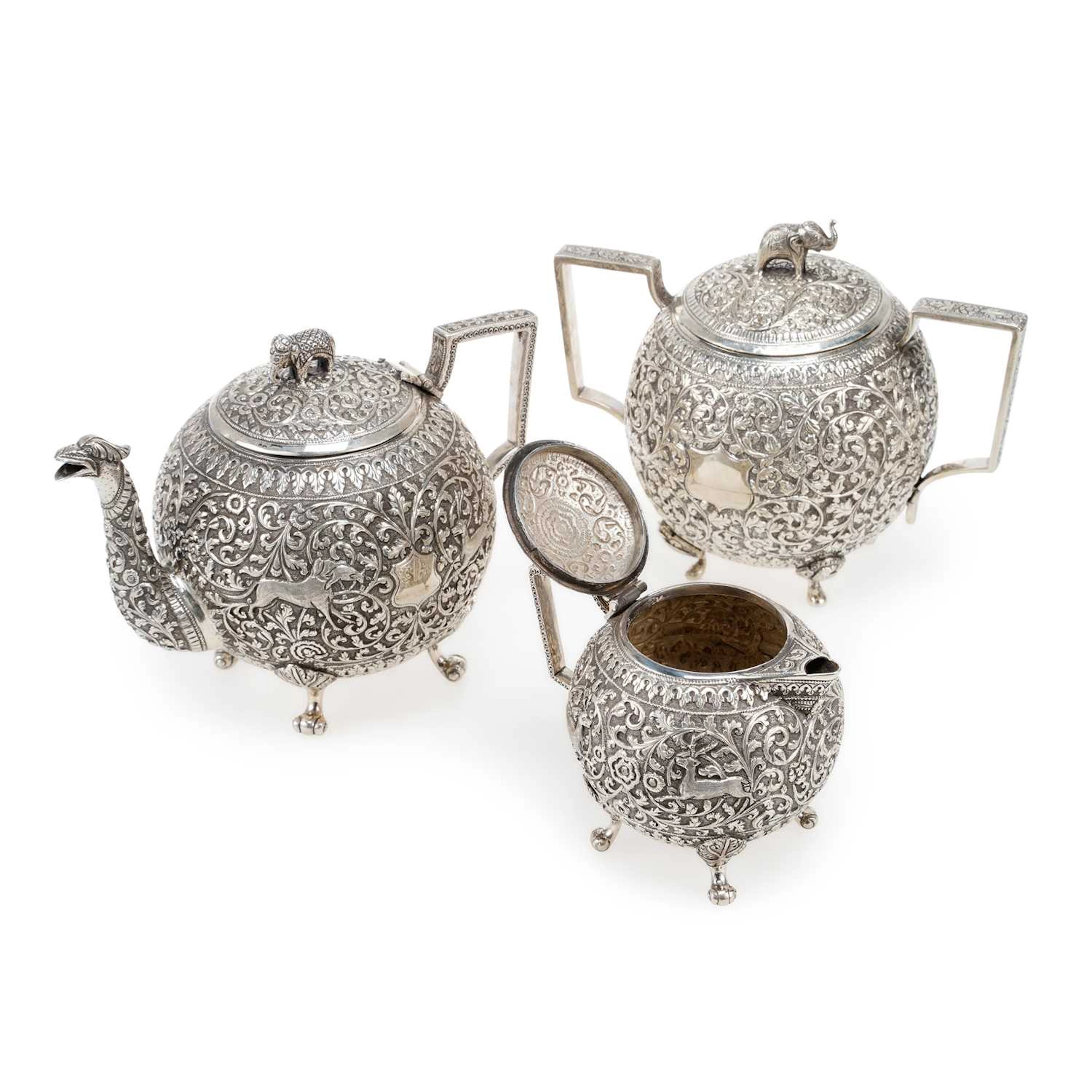 AN INDIAN SILVER MATCHED THREE-PIECE TEA SERVICE
