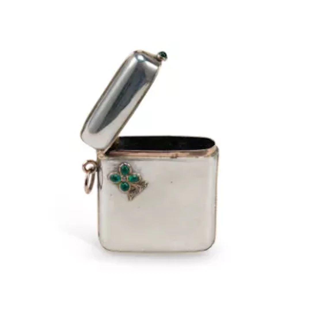 A CONTINENTAL SILVER, GOLD AND GEM-SET VESTA CASE