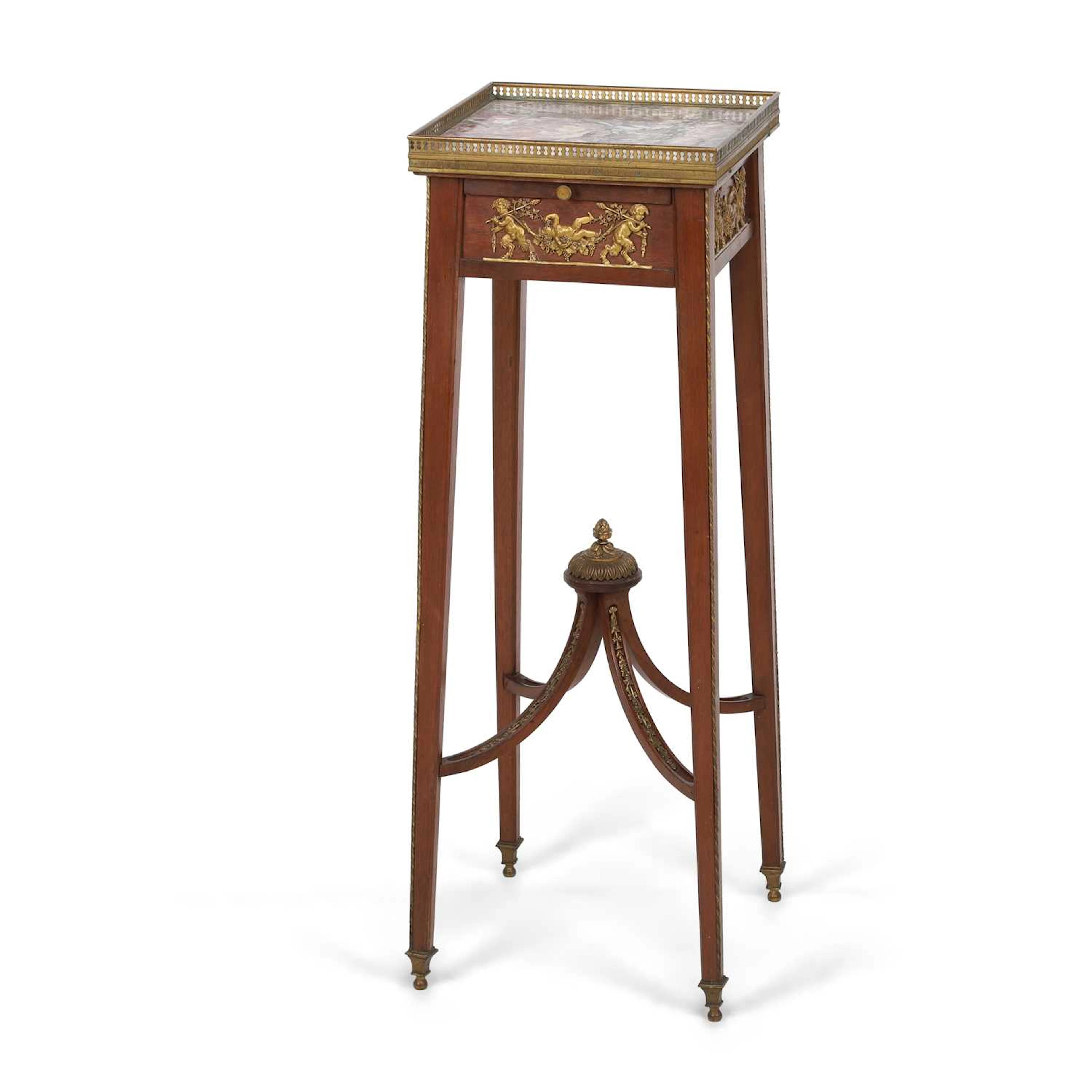 A LOUIS XVI STYLE MAHOGANY AND GILT BRONZE MOUNTED URN STAND