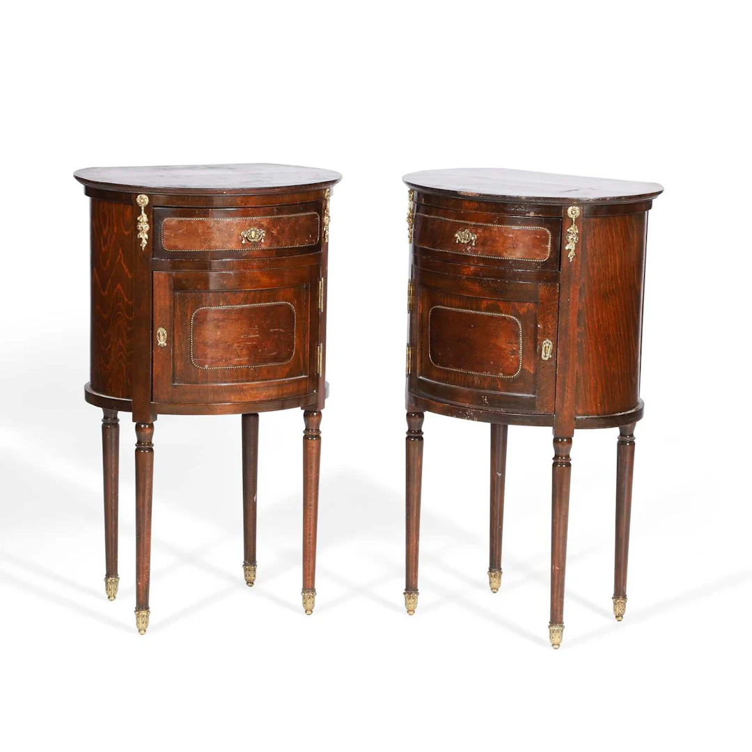 A PAIR OF FRENCH MAHOGANY BEDSIDE CABINETS
