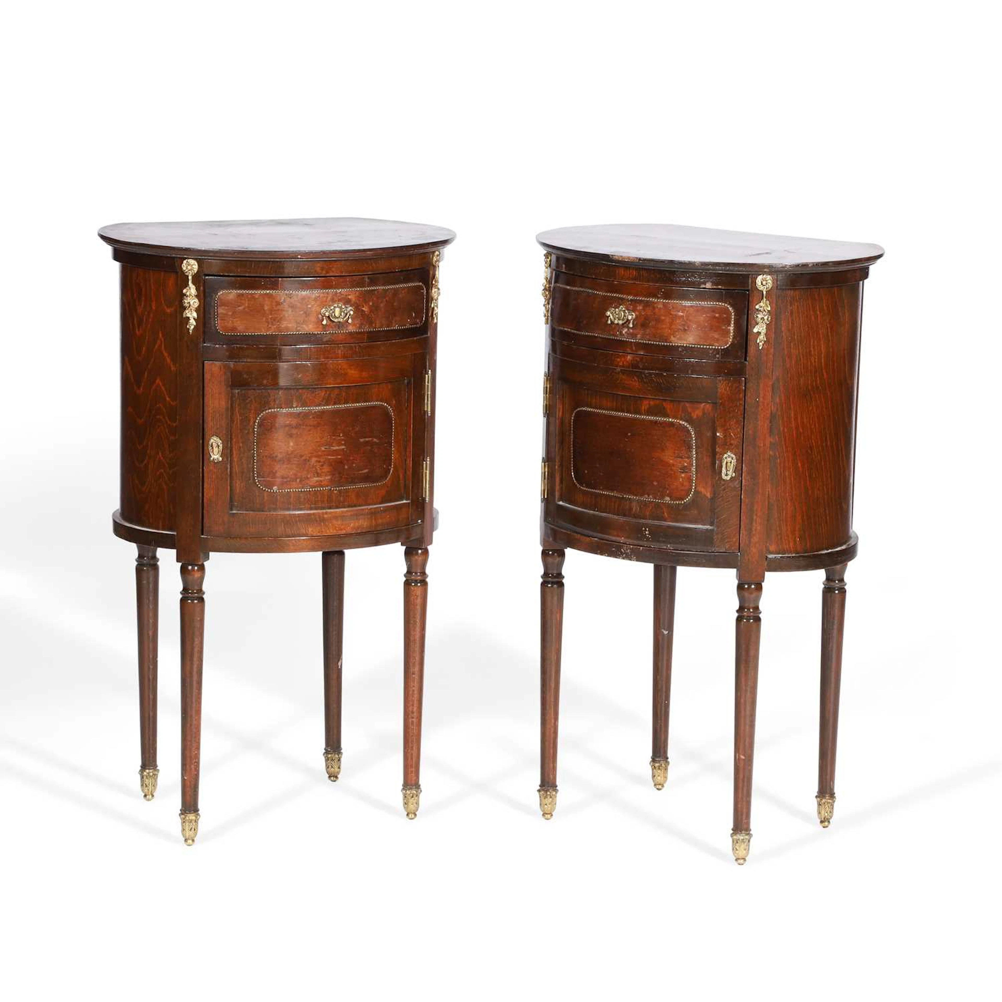 A PAIR OF FRENCH MAHOGANY BEDSIDE CABINETS