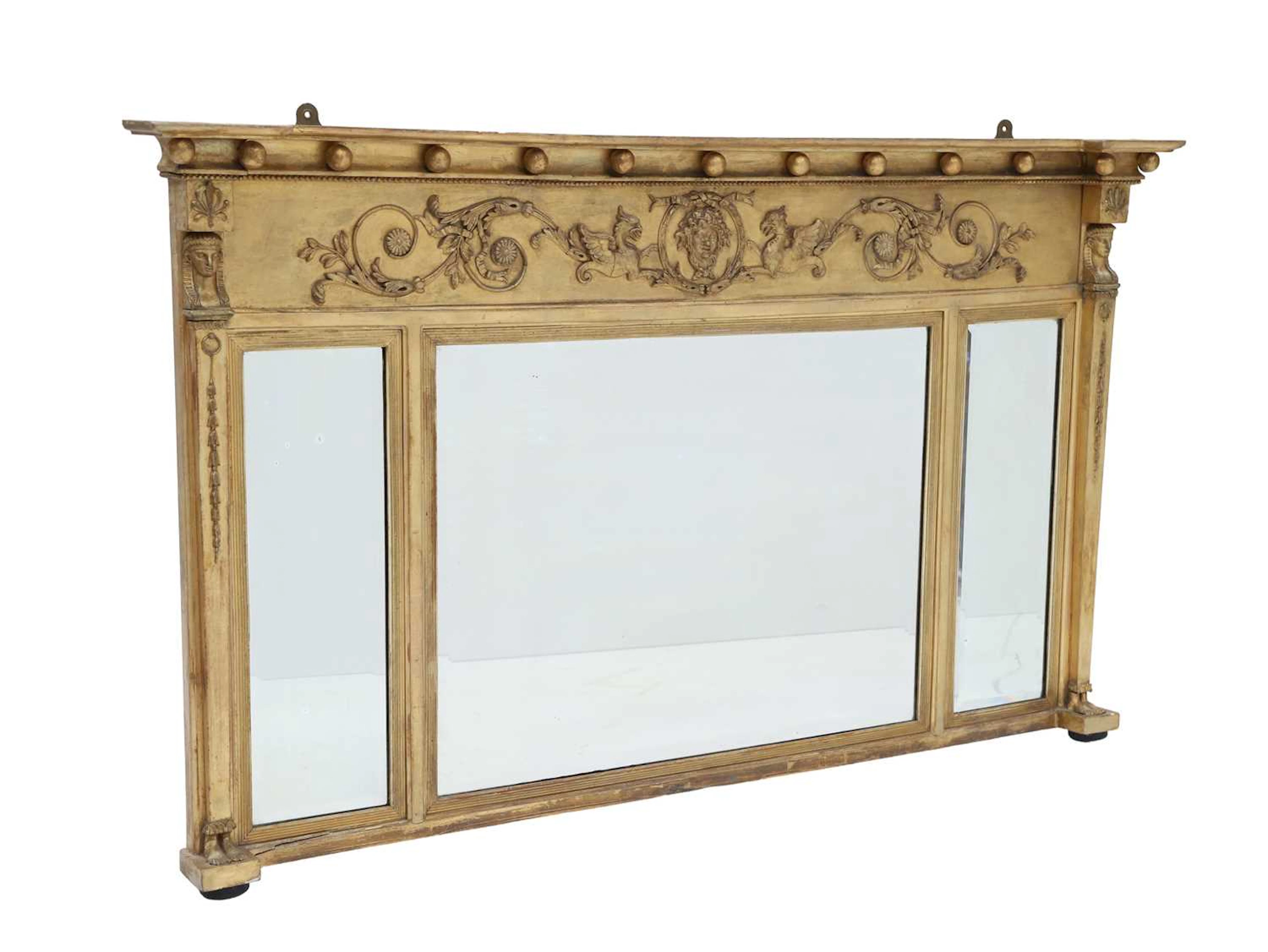 A REGENCY GILTWOOD AND GESSO TRIPLE PLATE OVERMANTEL MIRROR