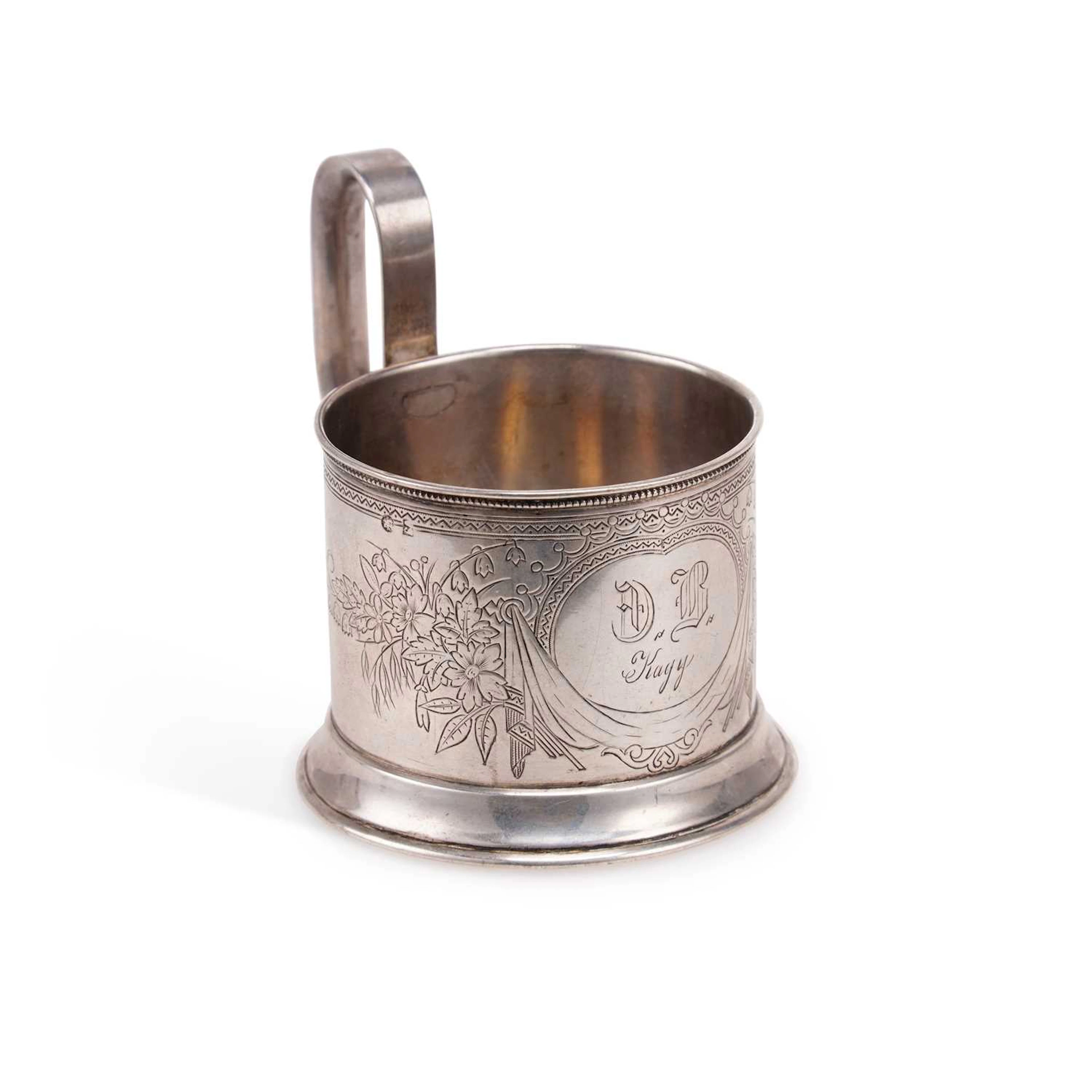 A RUSSIAN SILVER TEA GLASS HOLDER