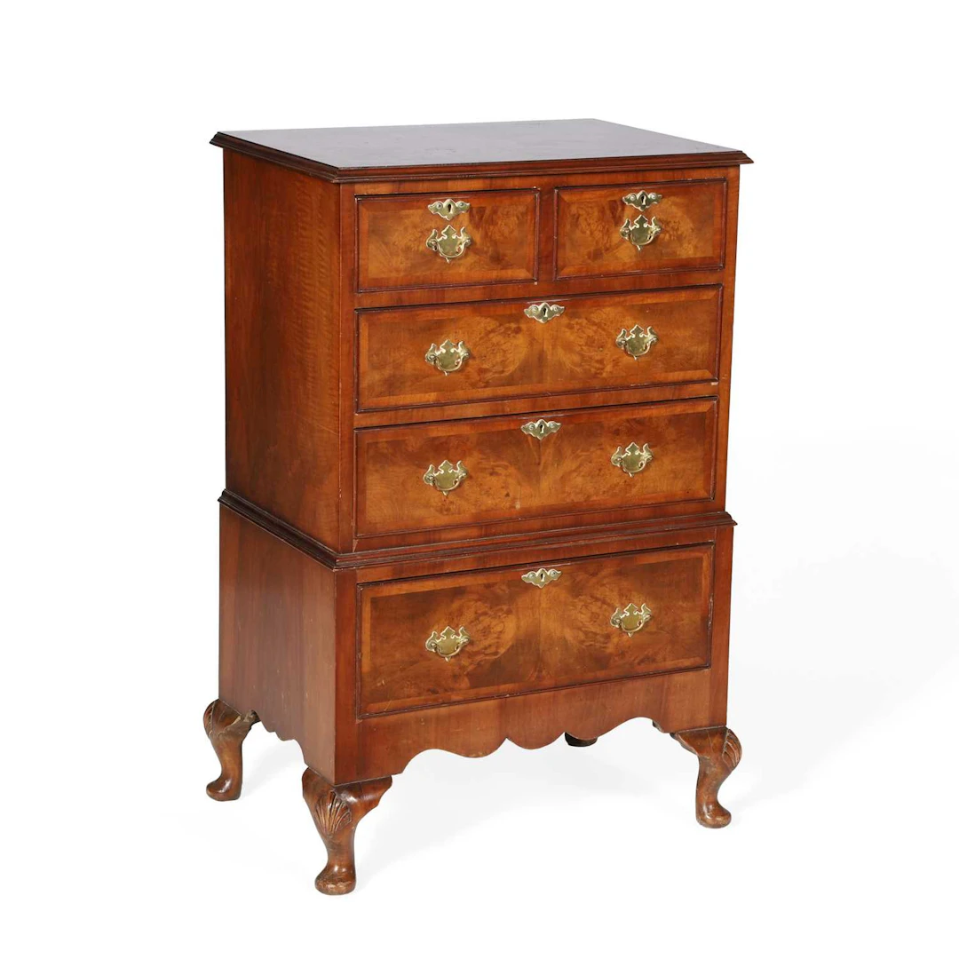 A SMALL WALNUT CHEST ON STAND