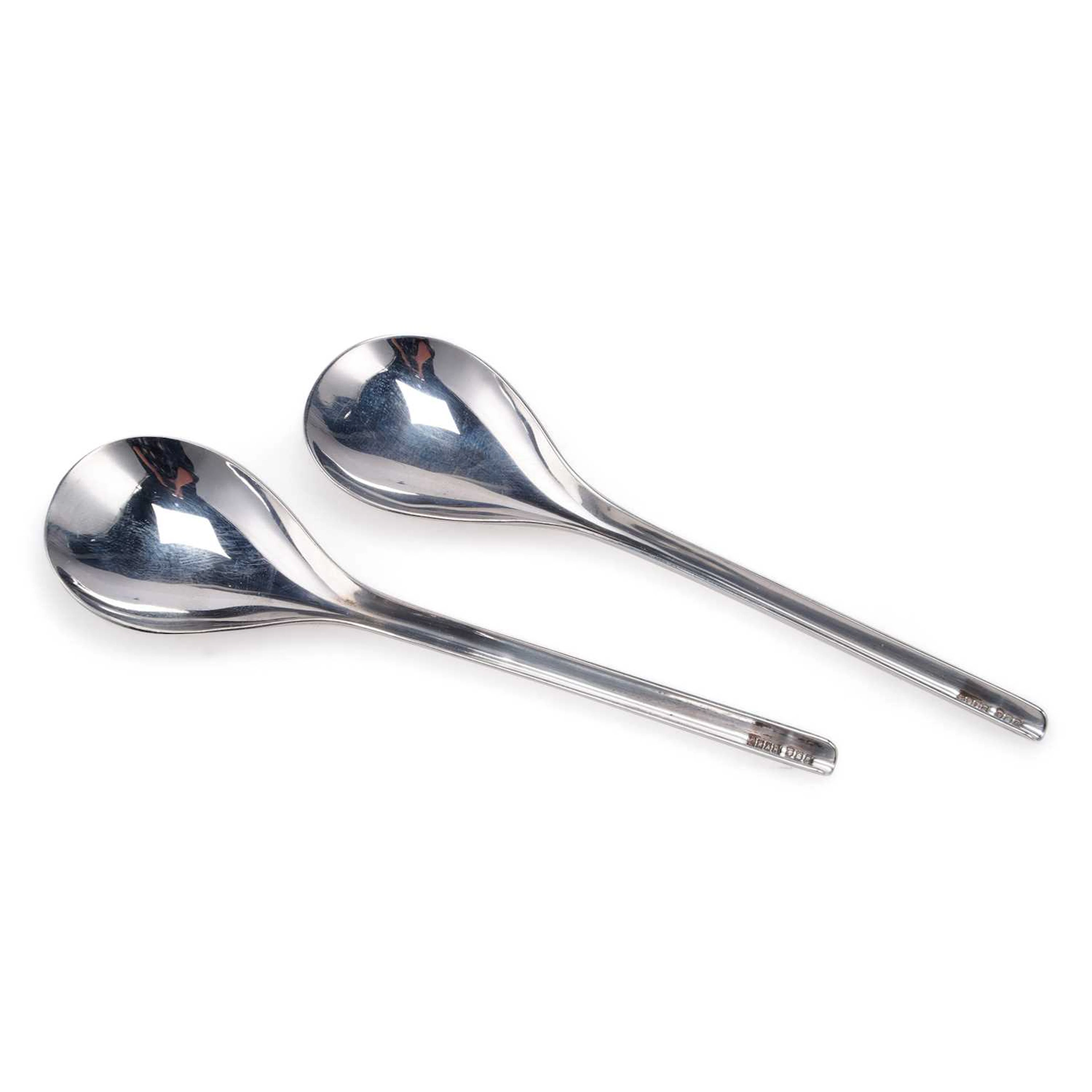 A PAIR OF ELIZABETH II MODERNIST SILVER SPOONS