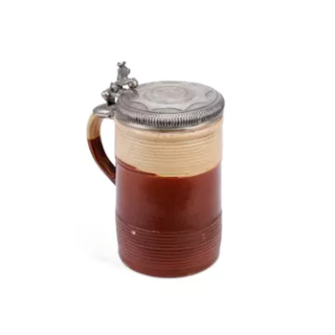 A SCANDINAVIAN SILVER-MOUNTED SALT-GLAZED TANKARD