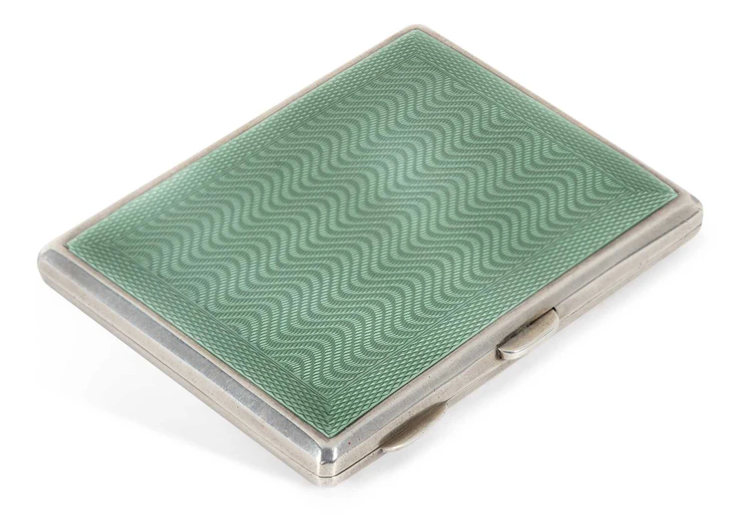 A GEORGE V ART DECO SILVER AND ENAMEL CIGARETTE CASE