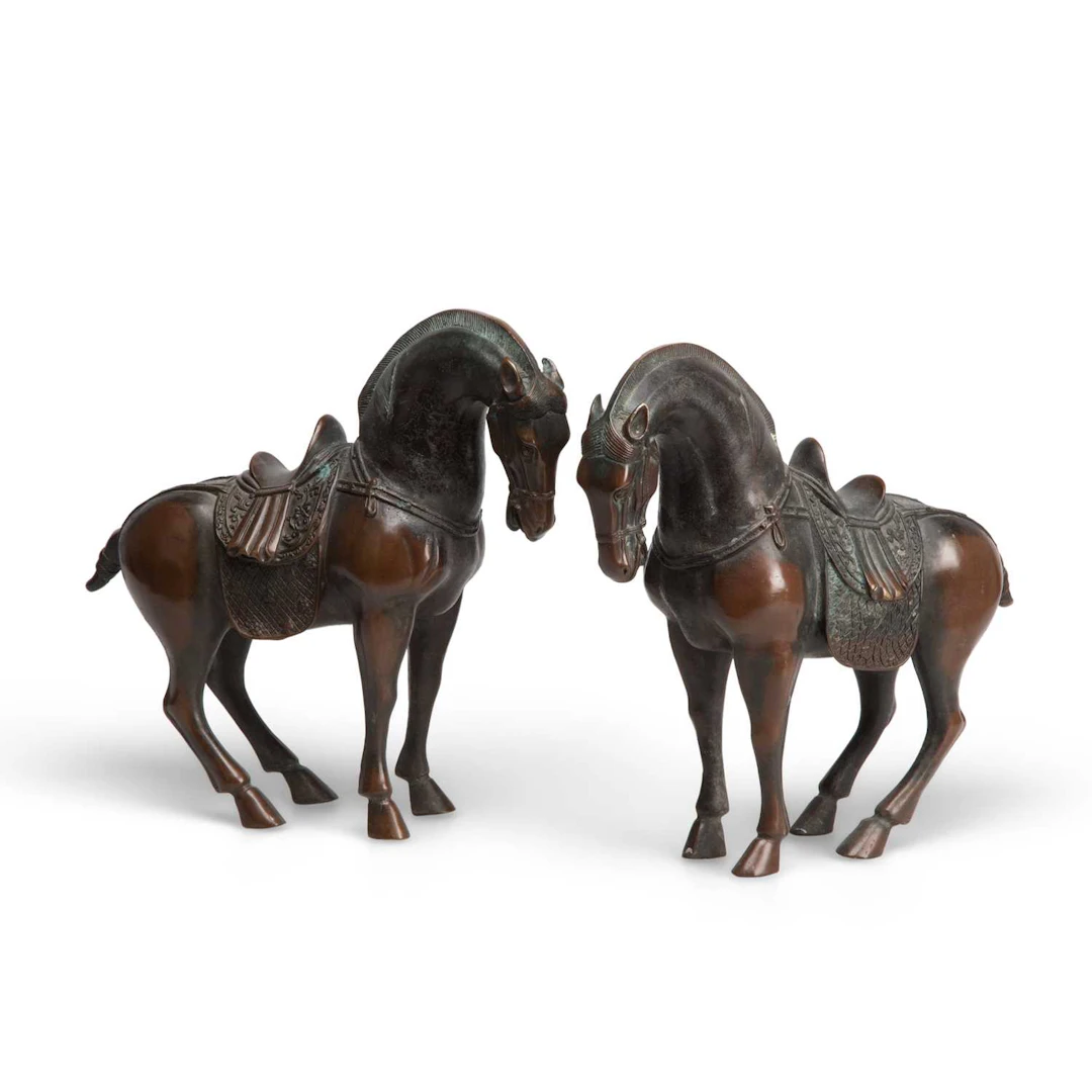 A PAIR OF BRONZE MODELS OF HORSES