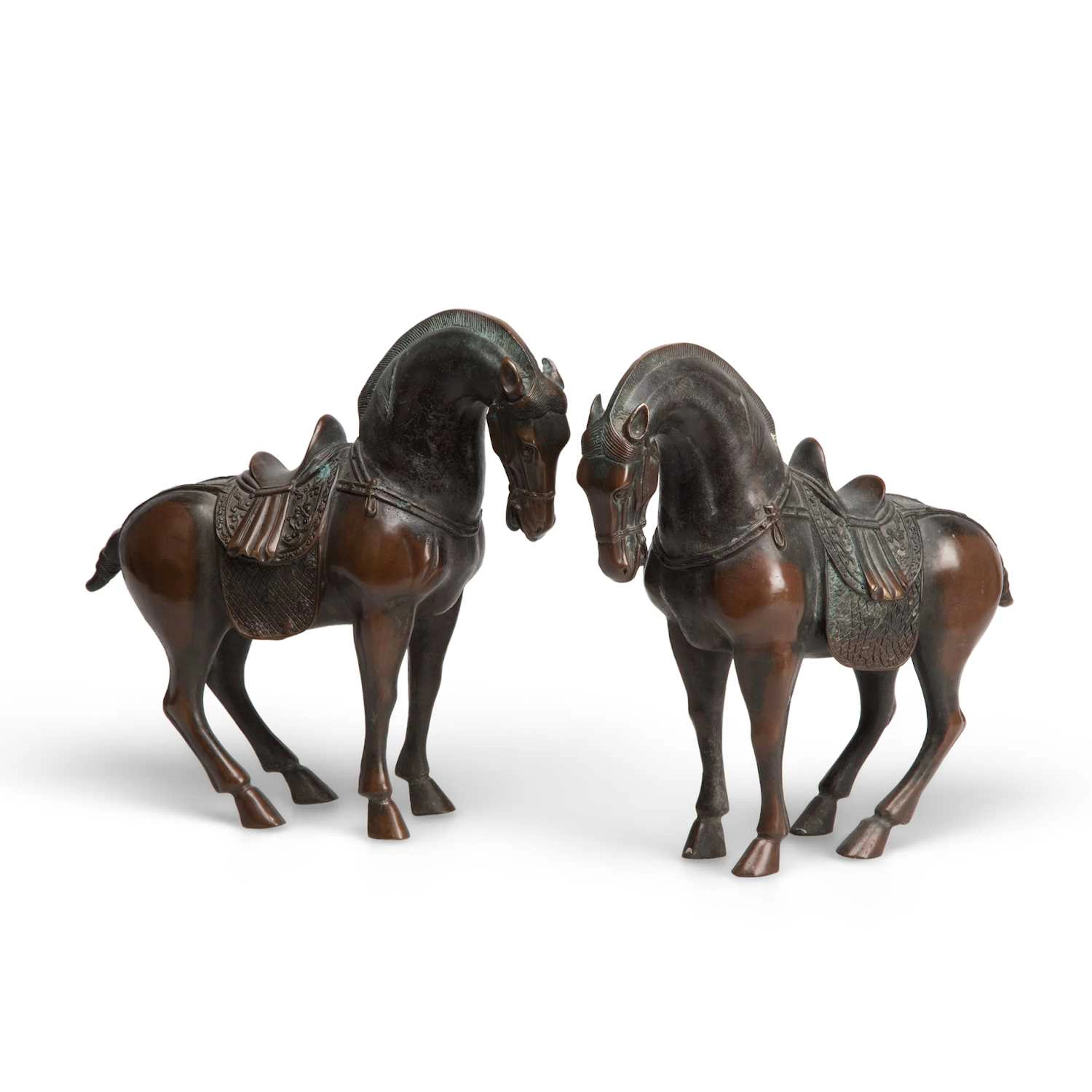 A PAIR OF BRONZE MODELS OF HORSES